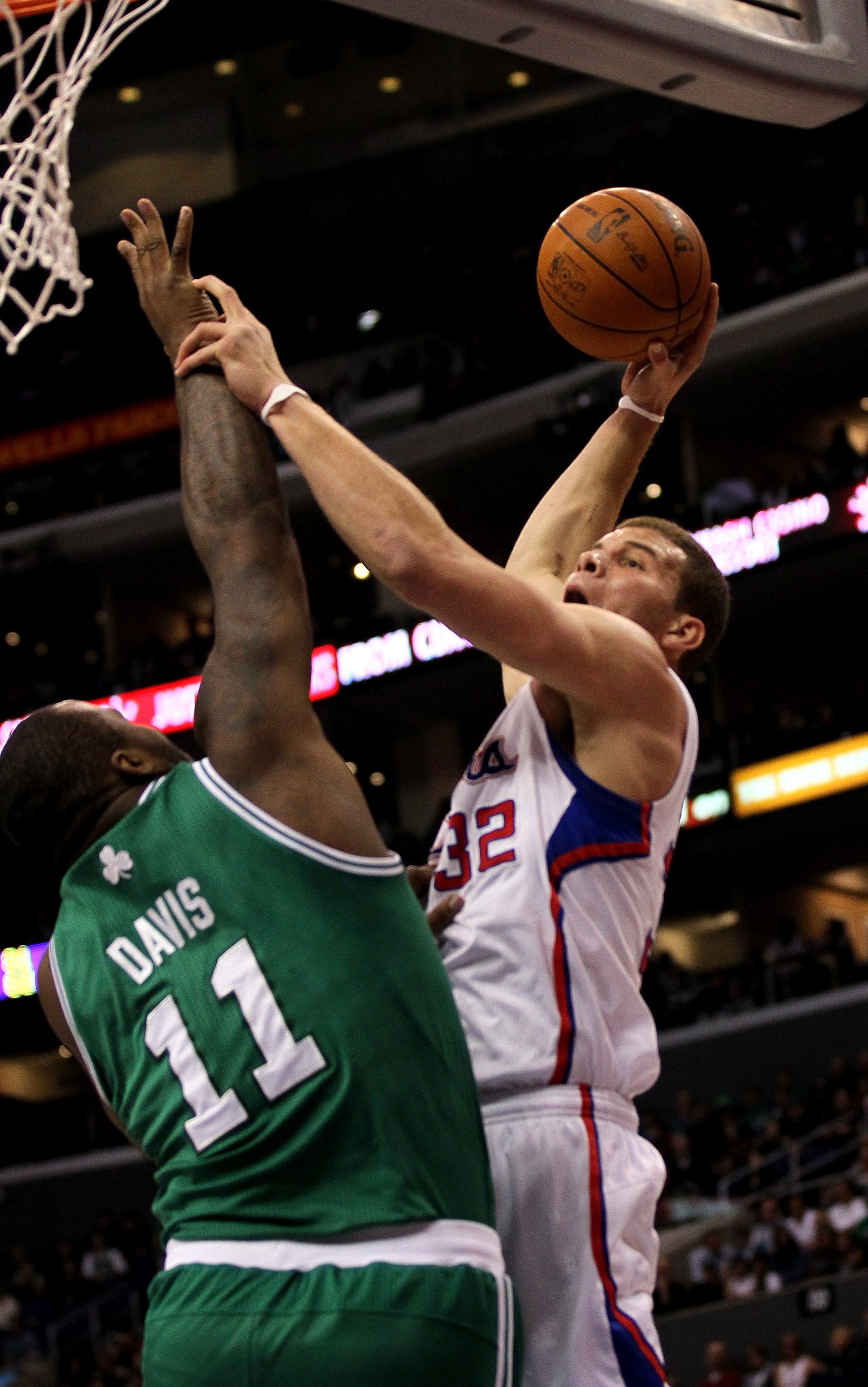 LOS ANGELES, CA - FEBRUARY 26: Blake Griffin #32 of the Los Angeles Clippers goes for a dunk over Glen Davis #11 of the Boston Celtics at Staples Center on February 26, 2011 in Los Angeles, California. The Celtics won 99-92. NOTE TO USER: User expressl LOS ANGELES, CA - FEBRUARY 26: Blake Griffin #32 of the Los Angeles Clippers goes for a dunk over Glen Davis #11 of the Boston Celtics at Staples Center on February 26, 2011 in Los Angeles, California. The Celtics won 99-92. NOTE TO USER: User expressl