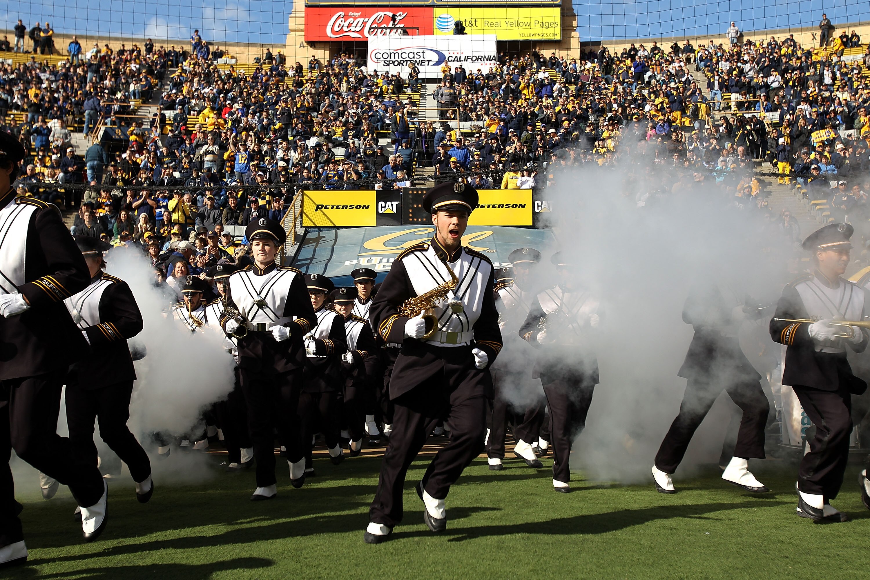 BERKELEY, CA - NOVEMBER 20:  Members of the California Golden Bears marching band run on to the field for their game against the Stanford Cardinal at California Memorial Stadium on November 20, 2010 in Berkeley, California.  (Photo by Ezra Shaw/Getty Imag