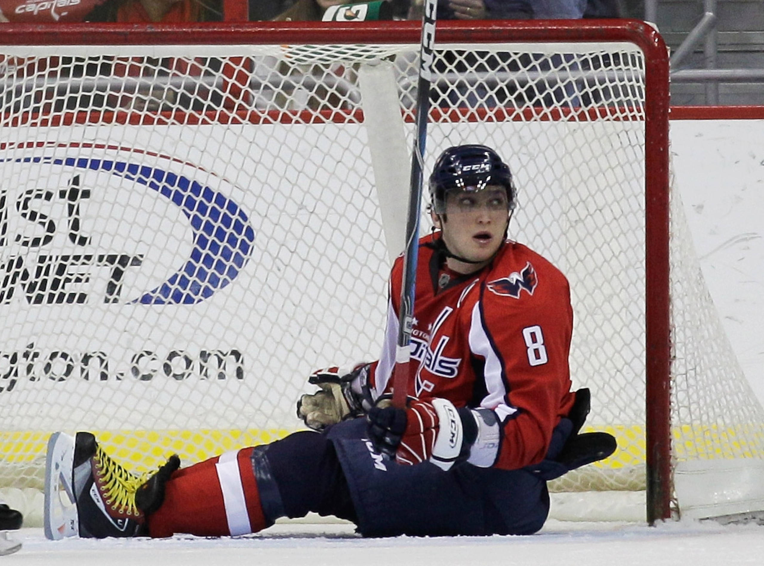 WASHINGTON, DC - FEBRUARY 25:  Alex Ovechkin #8 sits in the goal of the New York Rangers after missing a shot on goal at the Verizon Center on February 25, 2011 in Washington, DC.  (Photo by Rob Carr/Getty Images)