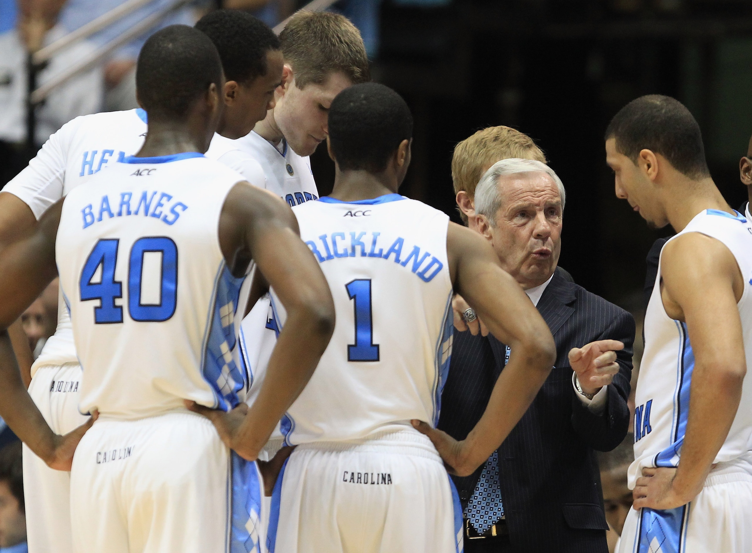 CHAPEL HILL, NC - FEBRUARY 27:  Head coach Roy Williams of the North Carolina Tar Heels talks to his team during their game against the Maryland Terrapins at the Dean E. Smith Center on February 27, 2011 in Chapel Hill, North Carolina.  (Photo by Streeter