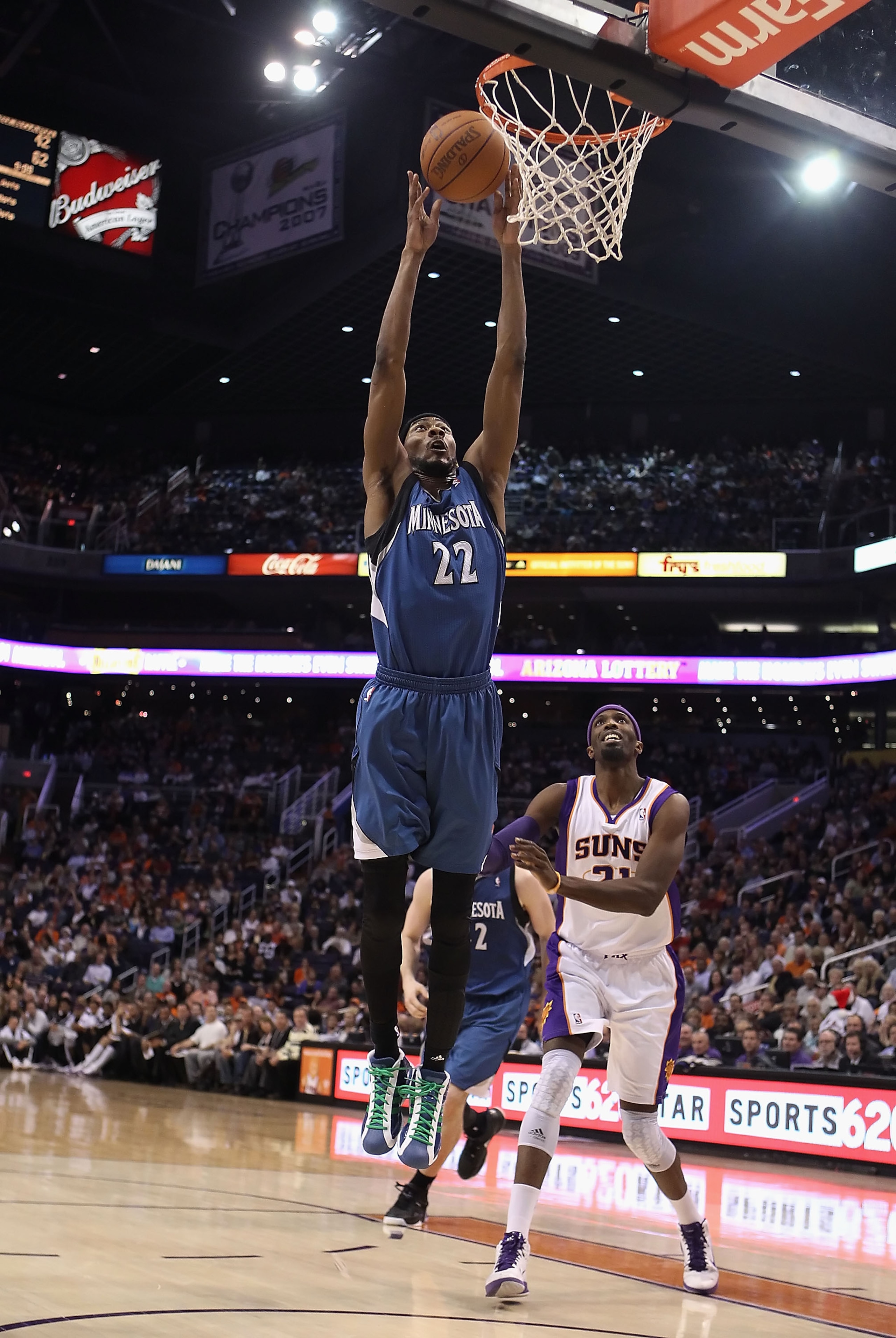 PHOENIX - DECEMBER 15:  Corey Brewer #22 of the Minnesota Timberwolves slam dunks the ball against the Phoenix Suns during the NBA game at US Airways Center on December 15, 2010 in Phoenix, Arizona. The Suns defeated the Timberwolves 128-122. NOTE TO USER