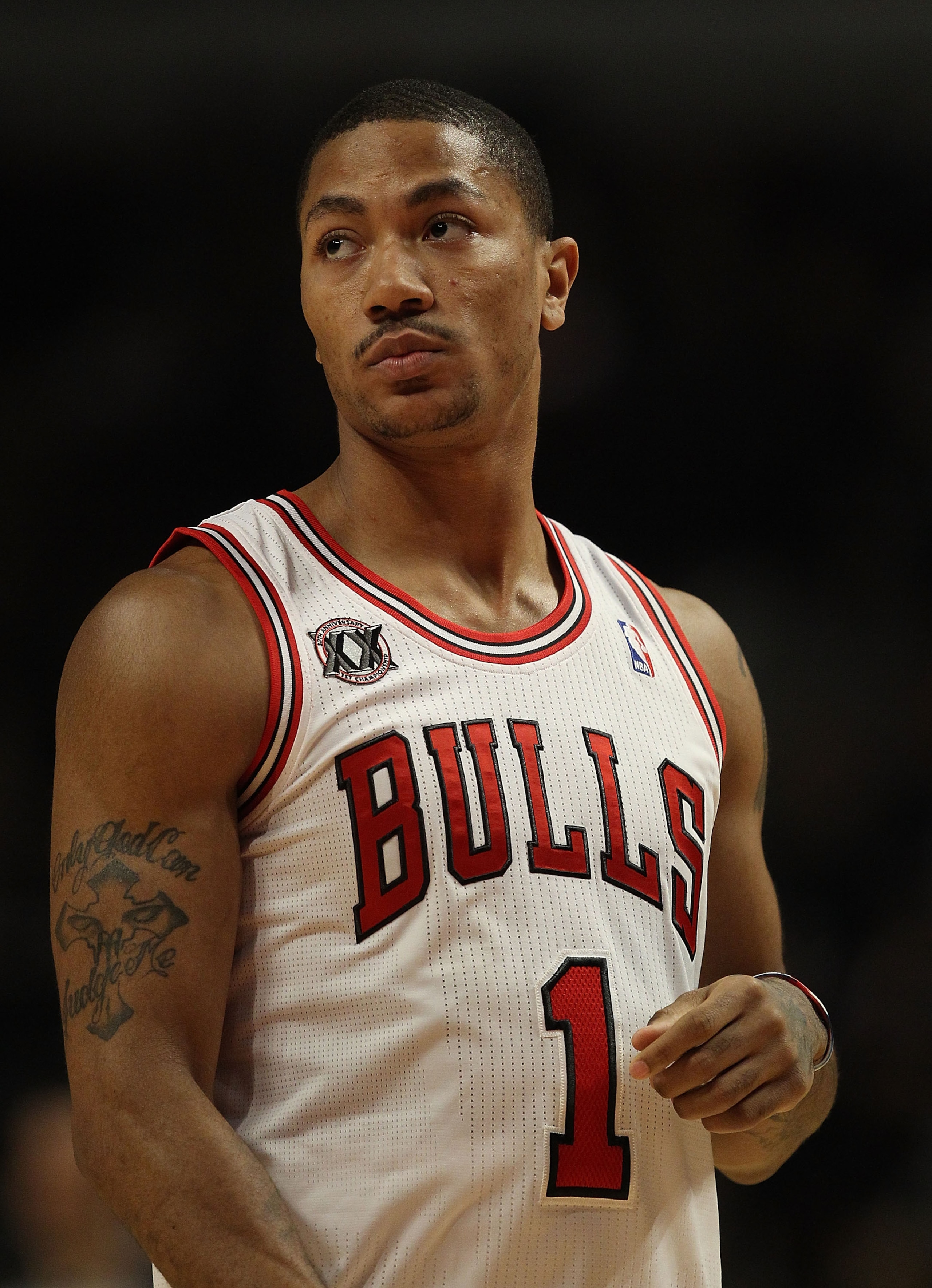 CHICAGO, IL - FEBRUARY 24: Derrick Rose #1 of the Chicago Bulls prepares for the tip-off before a game against the Miami Heat at the United Center on February 24, 2011 in Chicago, Illinois. The Bulls defeated the Heat 93-89. NOTE TO USER: User expressly a