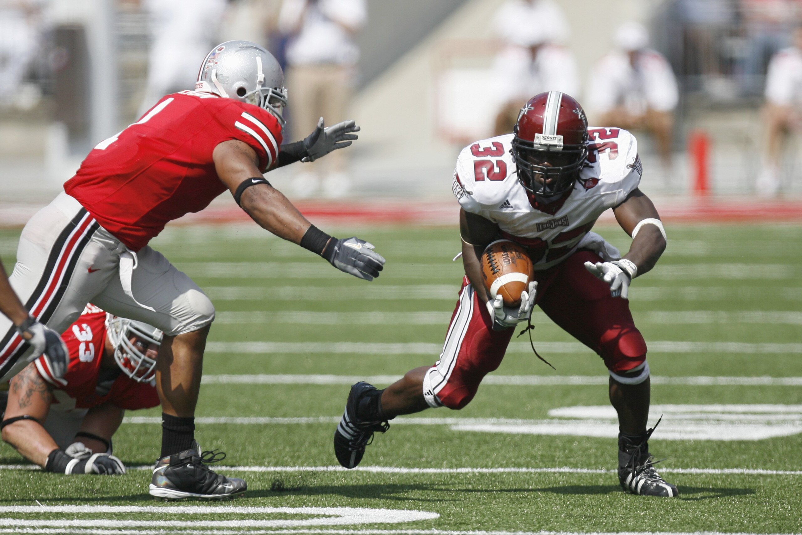 COLUMBUS, OH - SEPTEMBER 20:  DuJuan Harris #32 of the Troy Trojans carries the ball during the game against the Ohio State Buckeyes on September 20, 2008 at Ohio Stadium in Columbus, Ohio. Ohio State won the game 28-10. (Photo by Gregory Shamus/Getty Ima