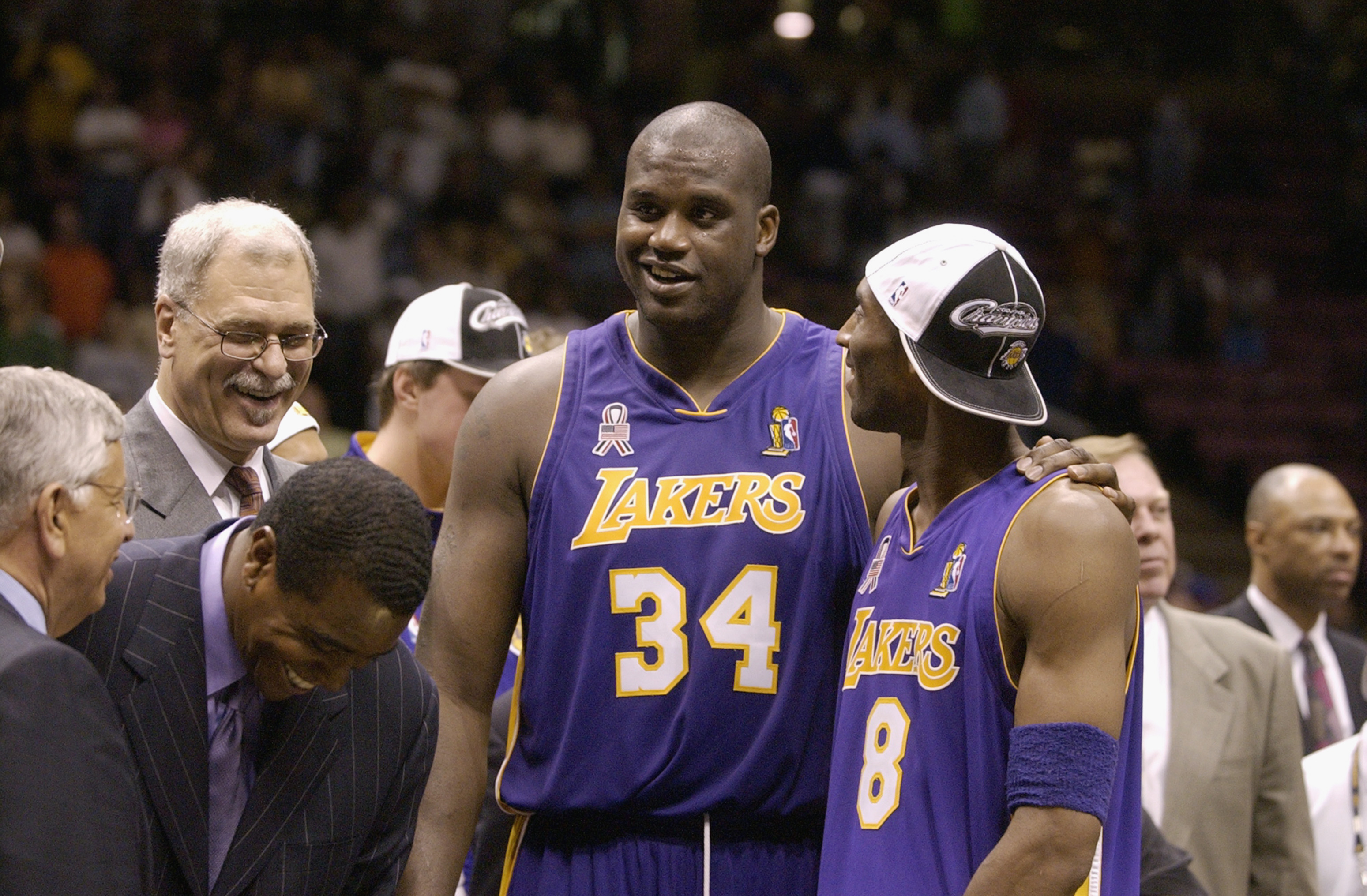Shaquille O'Neal and Kobe Bryant of the Los Angeles Lakers look on