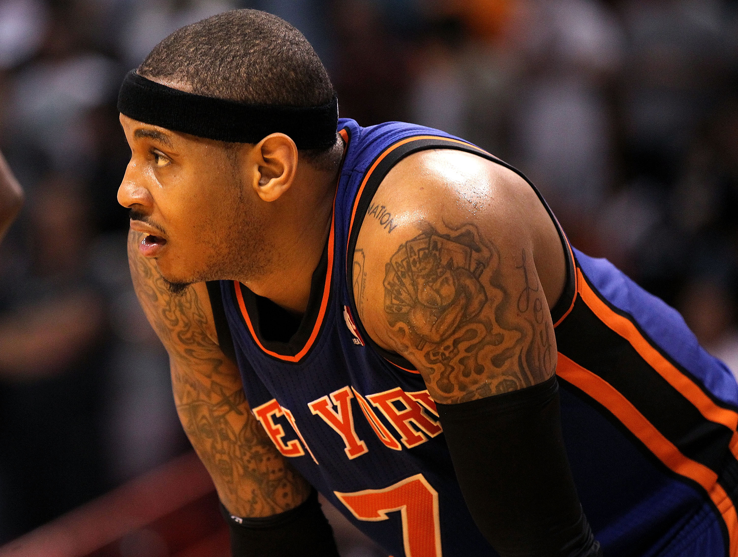 MIAMI, FL - FEBRUARY 27: Carmelo Anthony #7 of the New York Knicks looks on during a foul shot during a game gainst the Miami Heat at American Airlines Arena on February 27, 2011 in Miami, Florida. NOTE TO USER: User expressly acknowledges and agrees tha MIAMI, FL - FEBRUARY 27: Carmelo Anthony #7 of the New York Knicks looks on during a foul shot during a game gainst the Miami Heat at American Airlines Arena on February 27, 2011 in Miami, Florida. NOTE TO USER: User expressly acknowledges and agrees tha