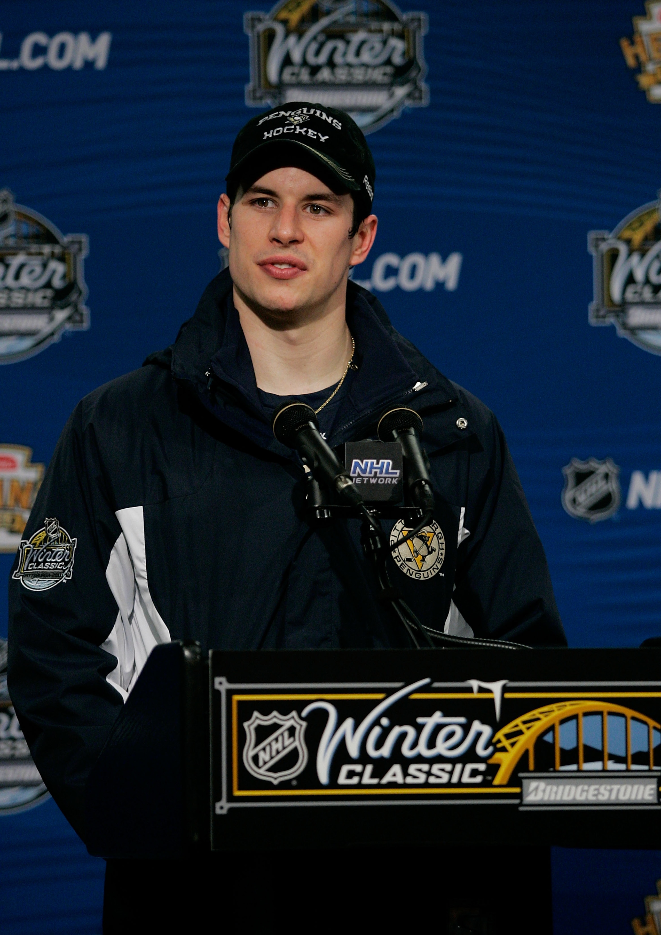 PITTSBURGH, PA - JANUARY 01: Sidney Crosby #87 of the Pittsburgh Penguins talks to the media during a press conference after losing 3-1 to the Washington Capitals during the 2011 NHL Bridgestone Winter Classic at Heinz Field on January 1, 2011 in Pittsbur