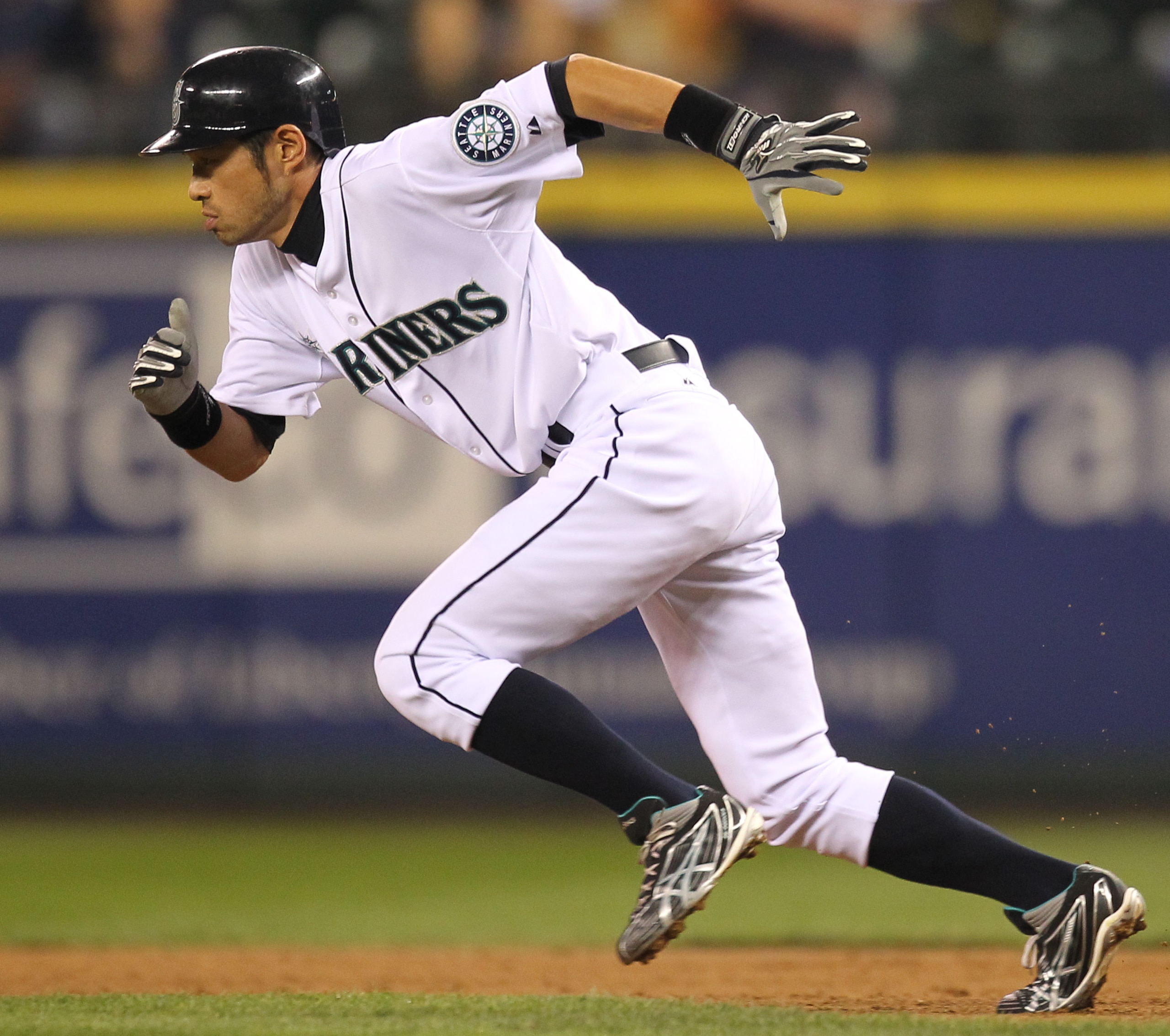 SEATTLE - SEPTEMBER 14:  Ichiro Suzuki #51 of the Seattle Mariners steals second base against the Boston Red Sox at Safeco Field on September 14, 2010 in Seattle, Washington. The Red Sox won 9-6. (Photo by Otto Greule Jr/Getty Images)