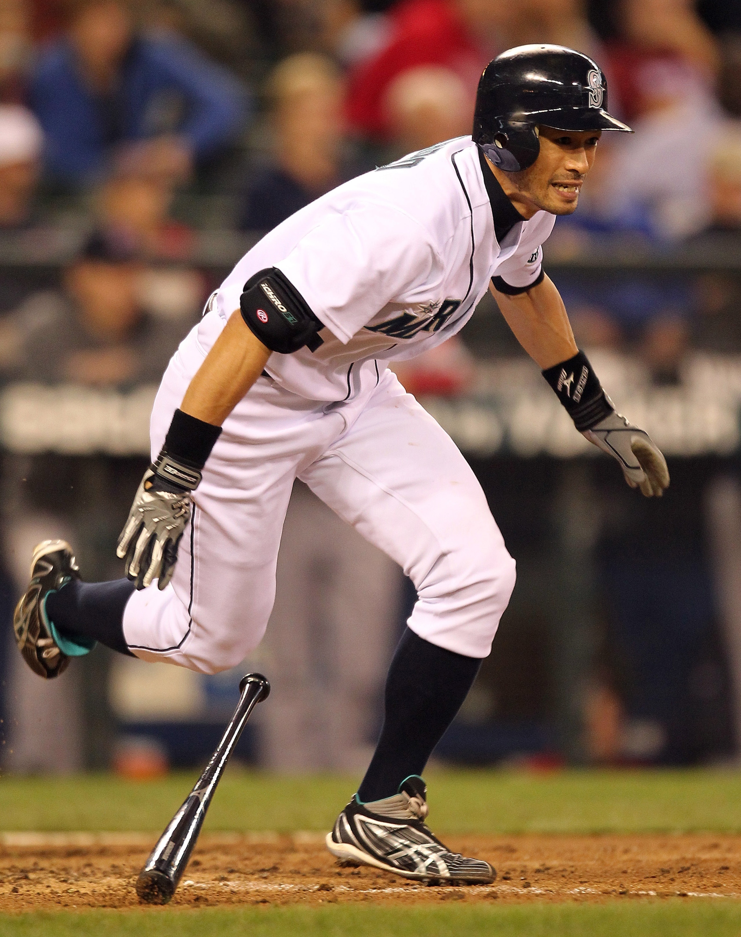 SEATTLE - SEPTEMBER 15:  Ichiro Suzuki #51 of the Seattle Mariners hits into a fielder's choice in the eighth inning against the Boston Red Sox at Safeco Field on September 15, 2010 in Seattle, Washington. The Red Sox defeated the Mariners 5-1. (Photo by
