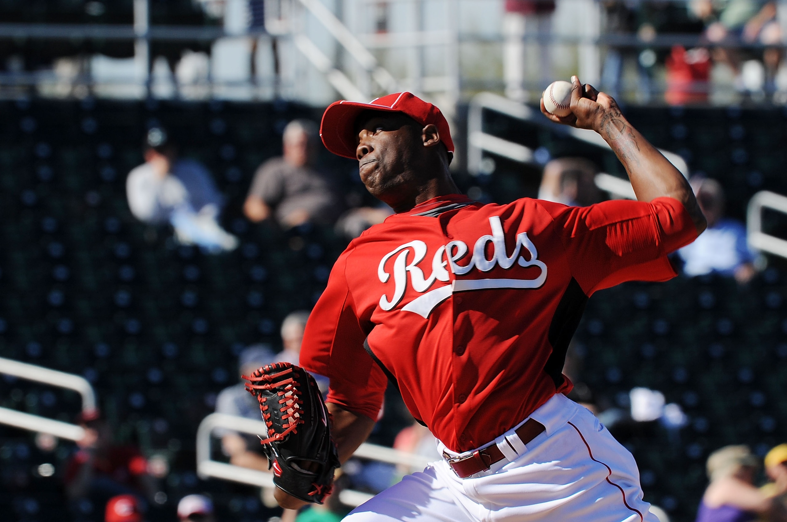 GOODYEAR, AZ - FEBRUARY 28:  Aroldis Chapman #54 of the Cincinnati Reds delivers a pitch against the Cleveland Indians at Goodyear Ballpark on February 28, 2011 in Goodyear, Arizona.  (Photo by Norm Hall/Getty Images)