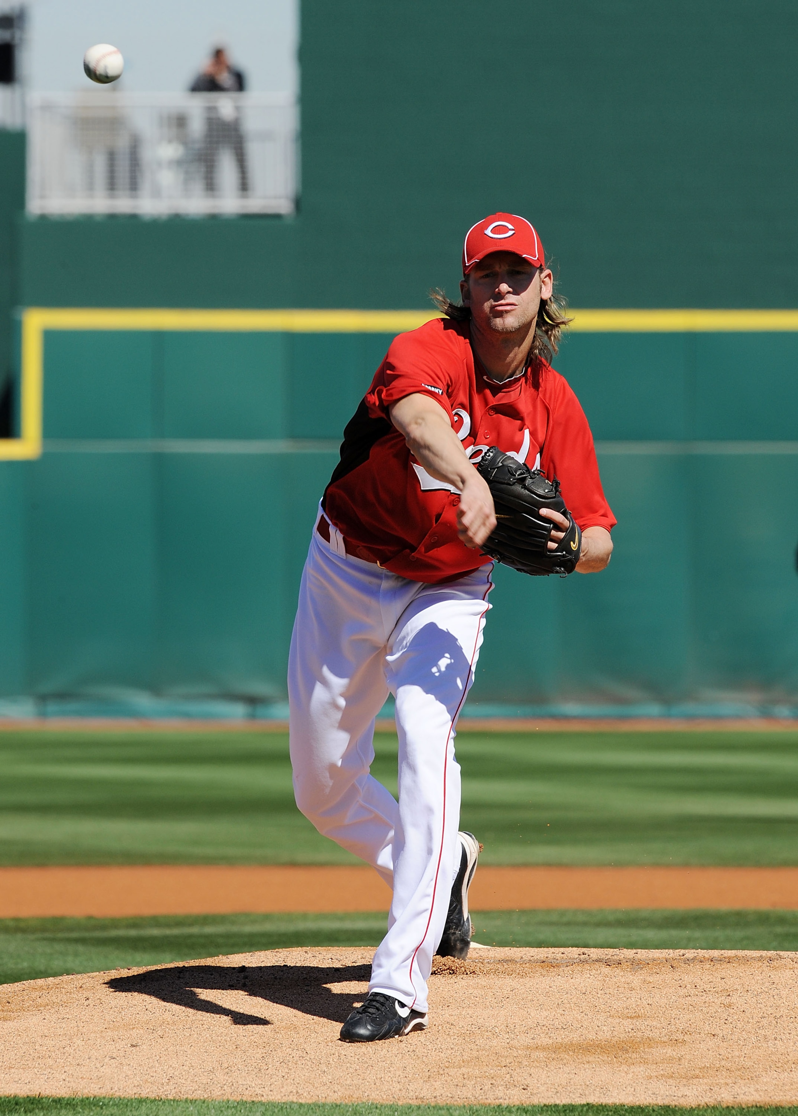 GOODYEAR, AZ - FEBRUARY 28:  Bronson Arroyo #61 of the Cincinnati Reds delivers a pitch against the Cleveland Indians at Goodyear Ballpark on February 28, 2011 in Goodyear, Arizona.  (Photo by Norm Hall/Getty Images)