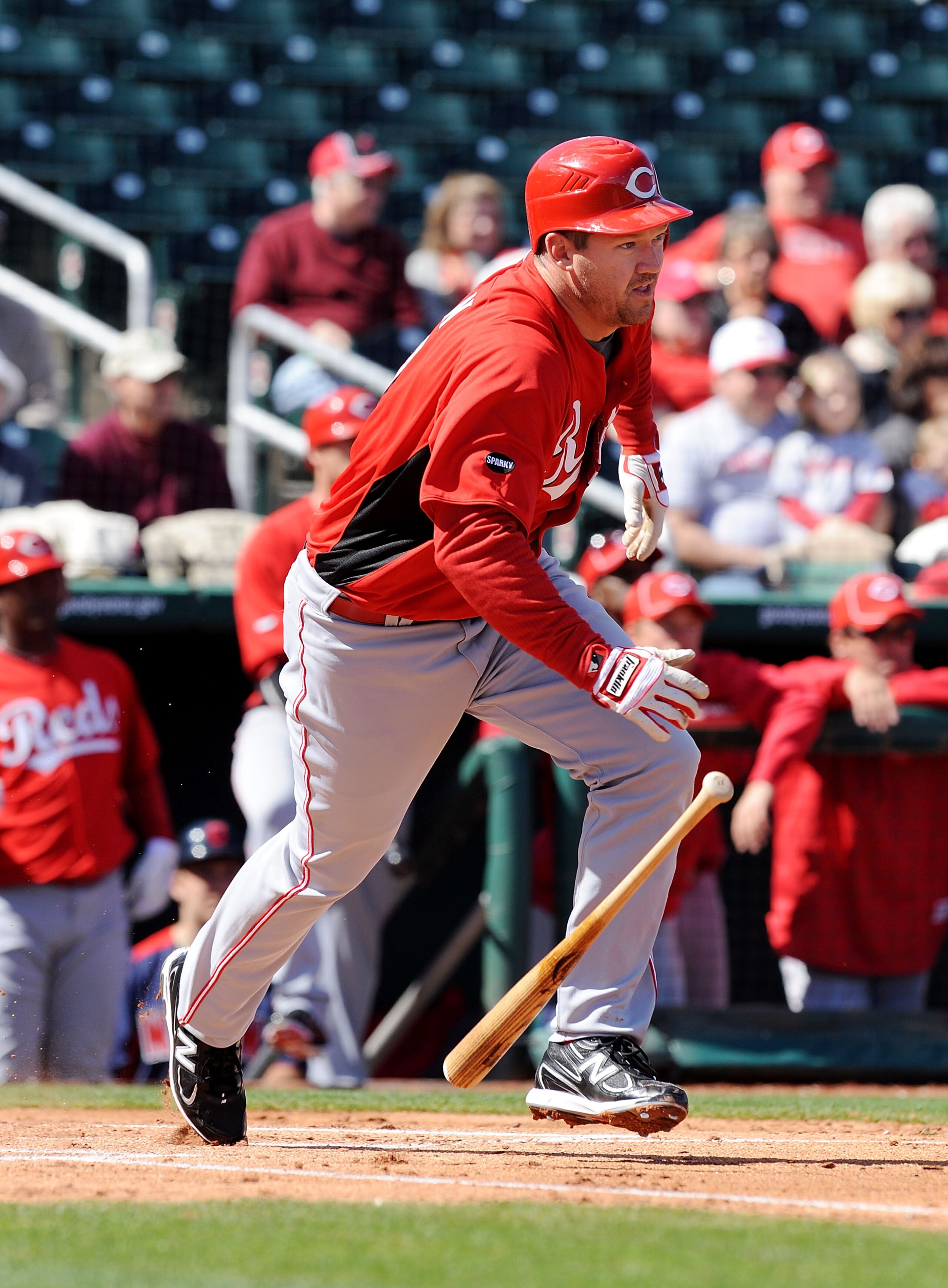 GOODYEAR, AZ - FEBRUARY 27:  Scott Rolen #27 of the Cincinnati Reds runs to first base after getting a base hit against the Cleveland Indians at Goodyear Ballpark on February 27, 2011 in Goodyear, Arizona.  (Photo by Norm Hall/Getty Images)