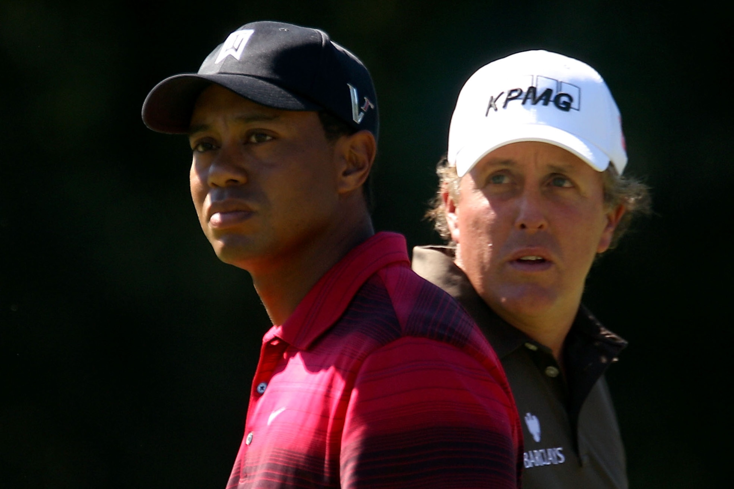 LEMONT, IL - SEPTEMBER 12:  (L-R) Tiger Woods and Phil Mickelson look on from the second hole during the final round of the BMW Championship at Cog Hill Golf & Country Club on September 12, 2010 in Lemont, Illinois.  (Photo by Scott Halleran/Getty Images)