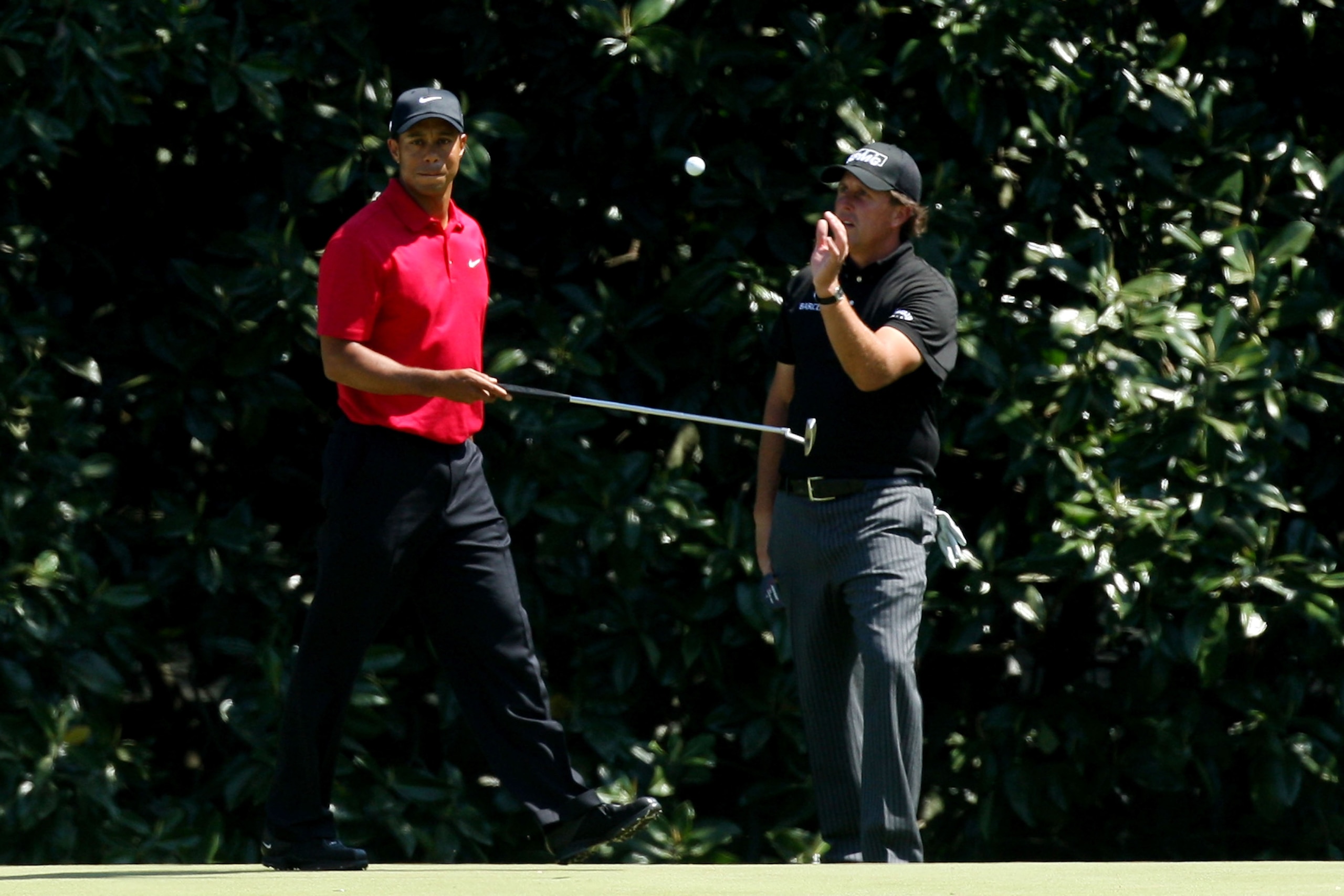 AUGUSTA, GA - APRIL 12:  Tiger Woods and Phil Mickelson wait on the fifth green during the final round of the 2009 Masters Tournament at Augusta National Golf Club on April 12, 2009 in Augusta, Georgia.  (Photo by David Cannon/Getty Images)