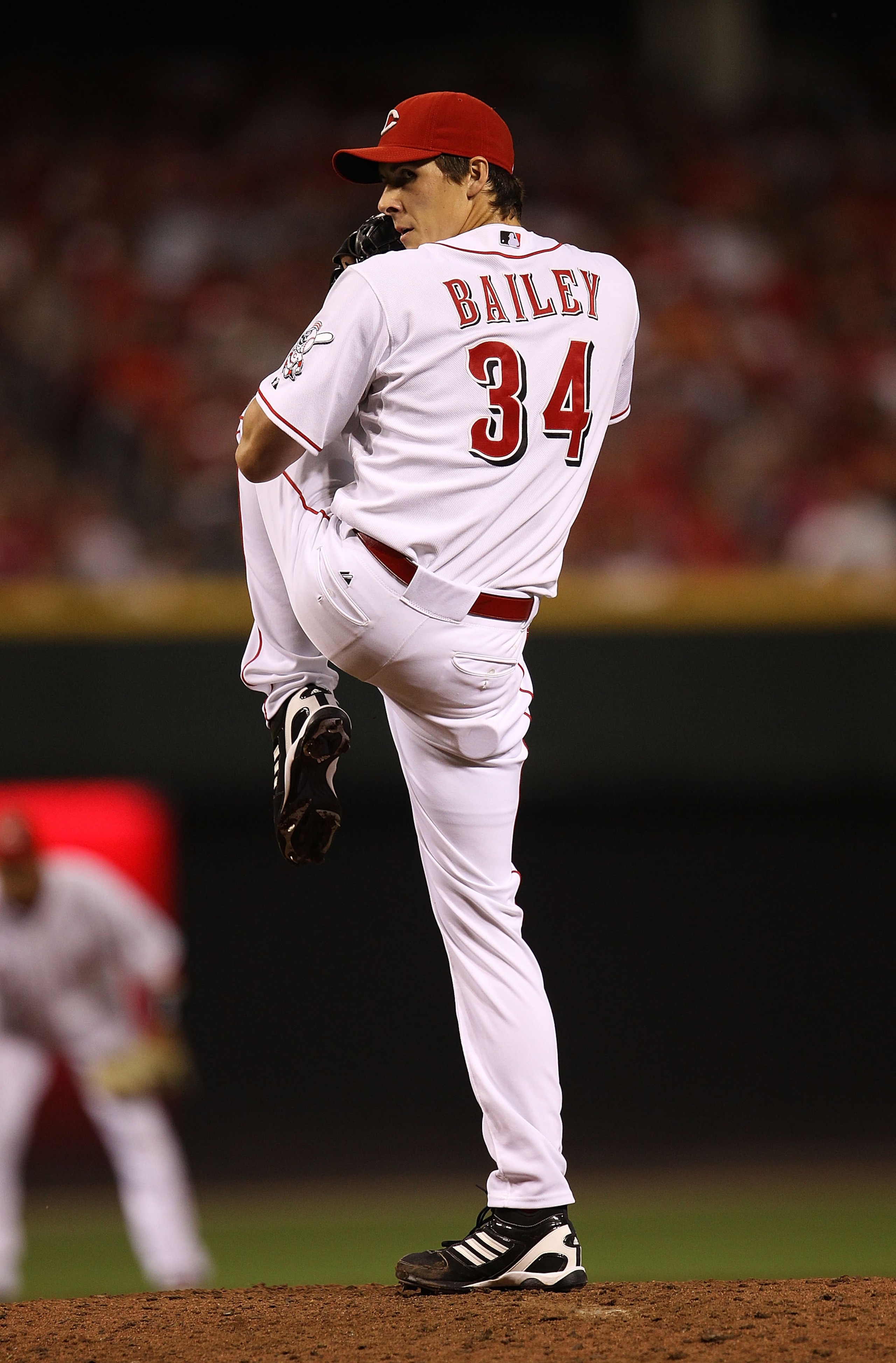 CINCINNATI - OCTOBER 10: Homer Bailey #34 of the Cincinnati Reds pitches against the Philadelphia Phillies during game 3 of the NLDS at Great American Ball Park on October 10, 2010 in Cincinnati, Ohio. The Phillies defeated the Reds 2-0. (Photo by Jonatha