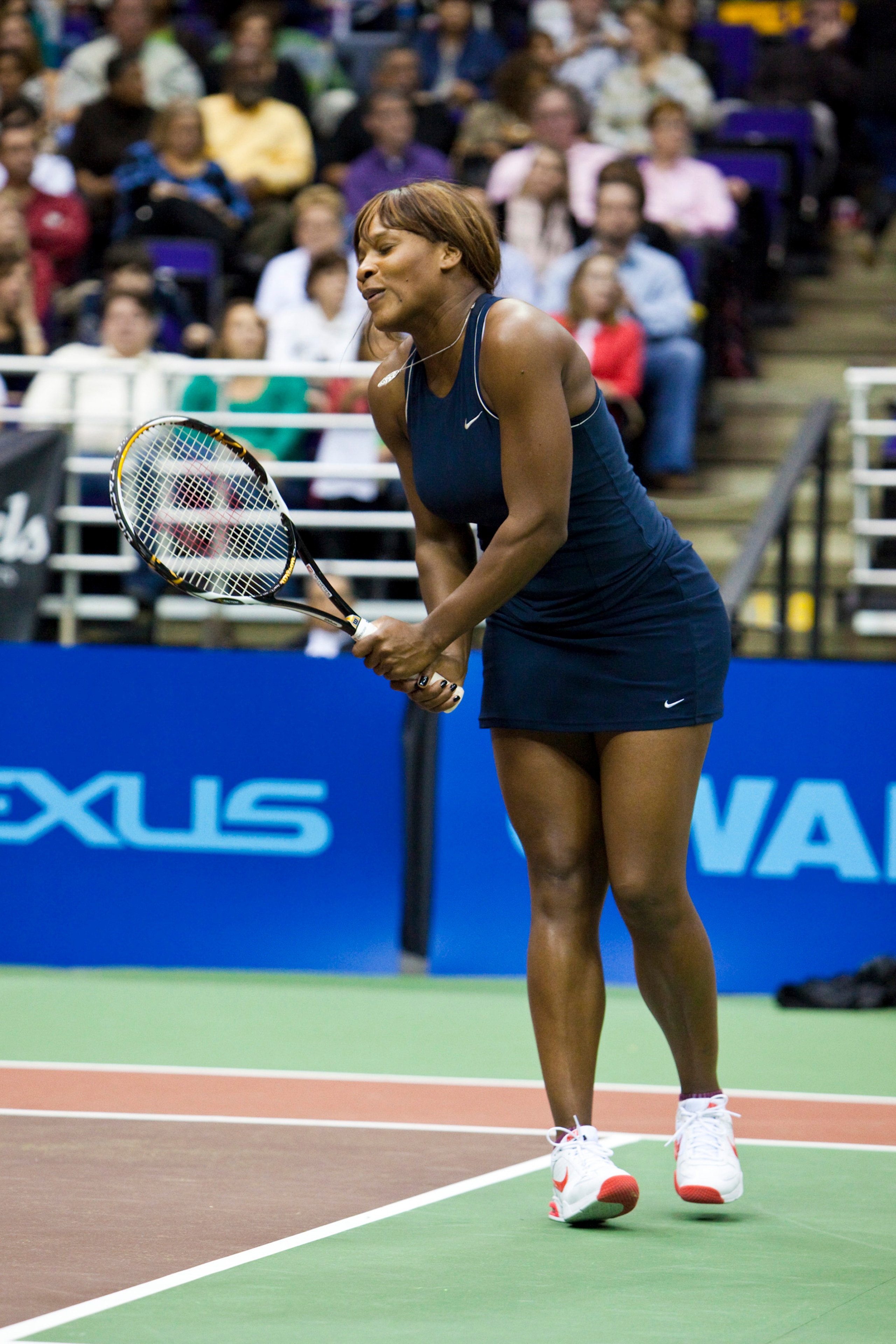 BATON ROUGE, LA - DECEMBER 08: Team Elton's teammate Serena Williams in action at the 17th Annual World Team Tennis Smash Hits benefiting the Elton John AIDS Foundation and Baton Rouge area AIDS charities at the Pete Maravich Assembly Center on December 8