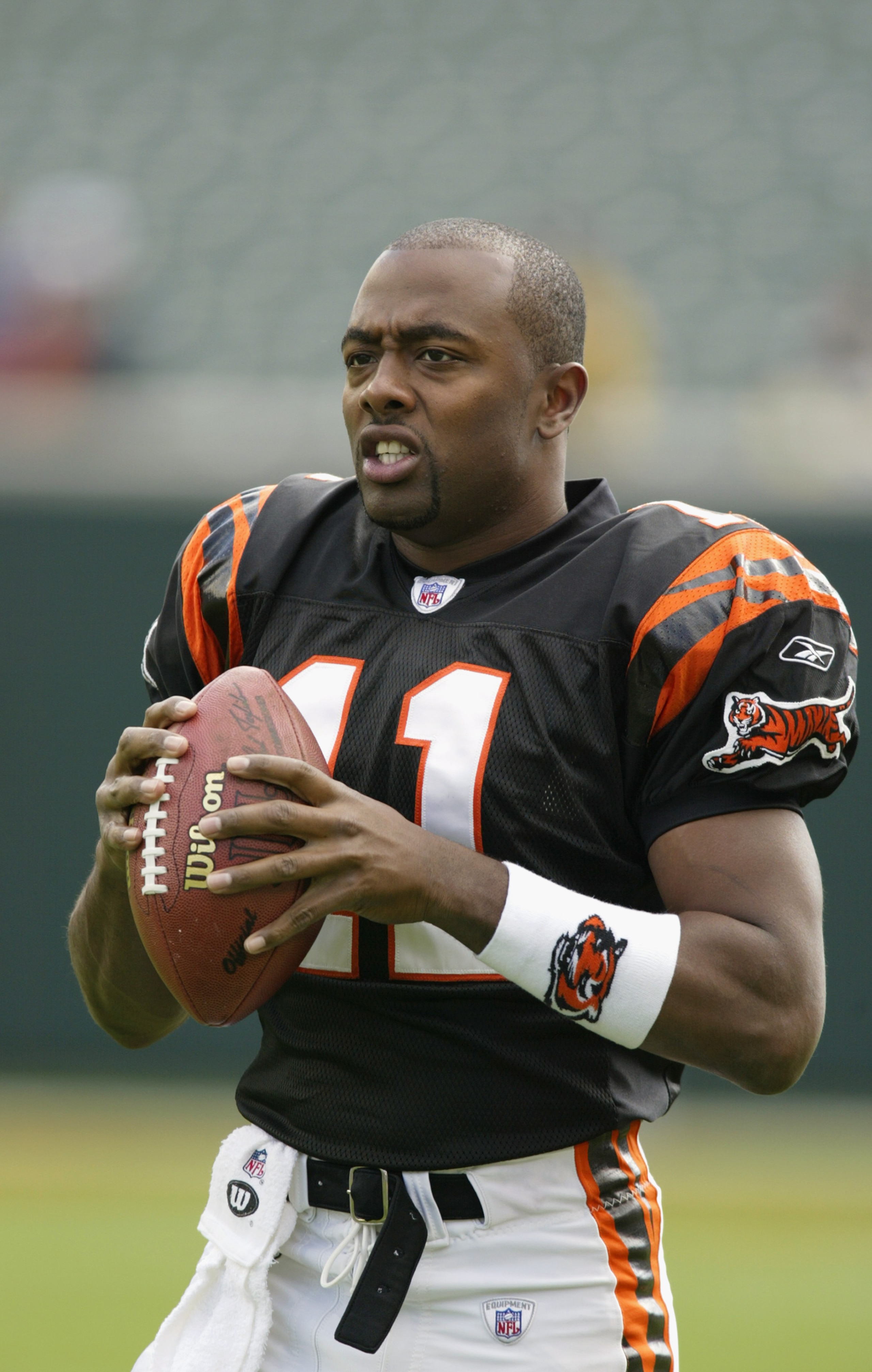 CINCINNATI - OCTOBER 13: Akili Smith #11 of the Cincinnati Bengals before a game against the Pittsburgh Steelers at Paul Brown Stadium on October 13, 2002 in Cincinnati, Ohio. The Steelers beat the Bengals 34-7. (Photo by Tom Pidgeon/Getty Images) CINCINNATI - OCTOBER 13: Akili Smith #11 of the Cincinnati Bengals before a game against the Pittsburgh Steelers at Paul Brown Stadium on October 13, 2002 in Cincinnati, Ohio. The Steelers beat the Bengals 34-7. (Photo by Tom Pidgeon/Getty Images)