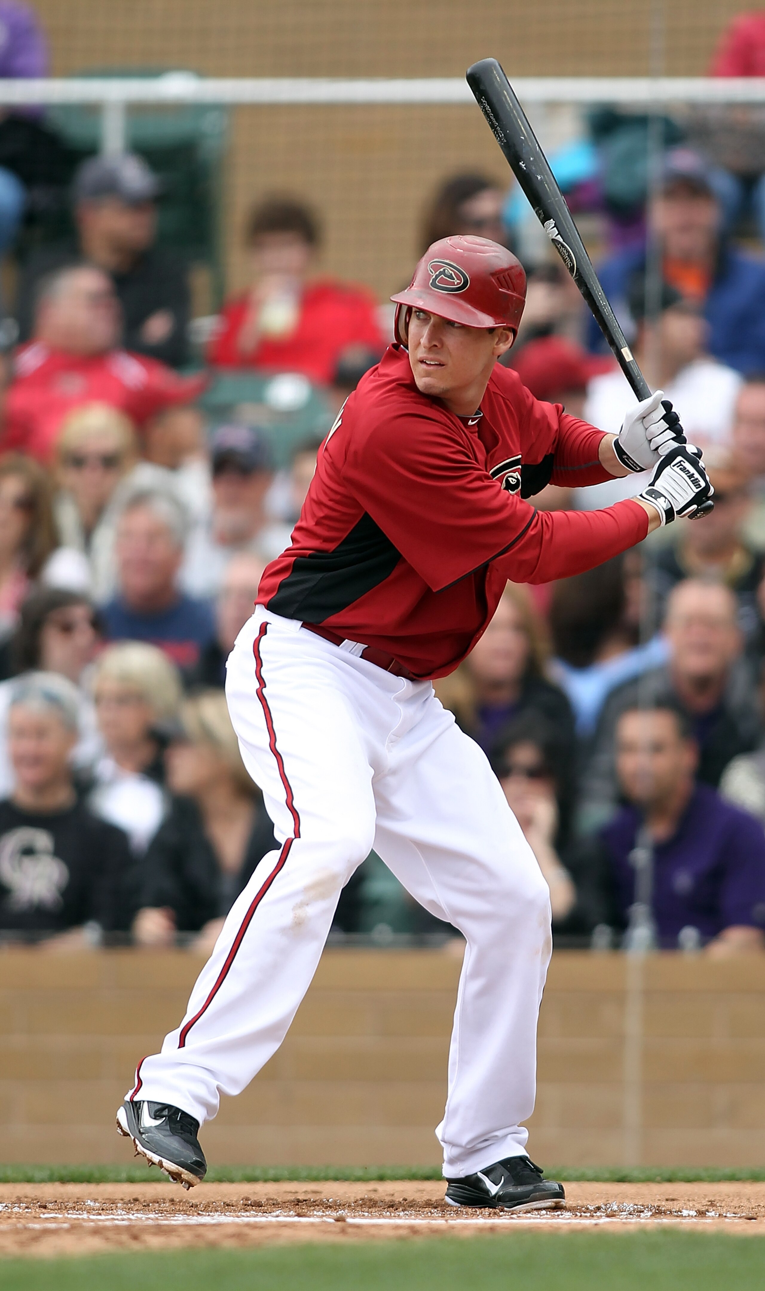 SCOTTSDALE, AZ - FEBRUARY 26: Kelly Johnson #2 of the Arizona Diamondbacks swings his bat against the Colorado Rockies at Salt River Fields on February 26, 2011 in Scottsdale, Arizona.. (Photo by Jonathan Ferrey/Getty Images) SCOTTSDALE, AZ - FEBRUARY 26: Kelly Johnson #2 of the Arizona Diamondbacks swings his bat against the Colorado Rockies at Salt River Fields on February 26, 2011 in Scottsdale, Arizona.. (Photo by Jonathan Ferrey/Getty Images)