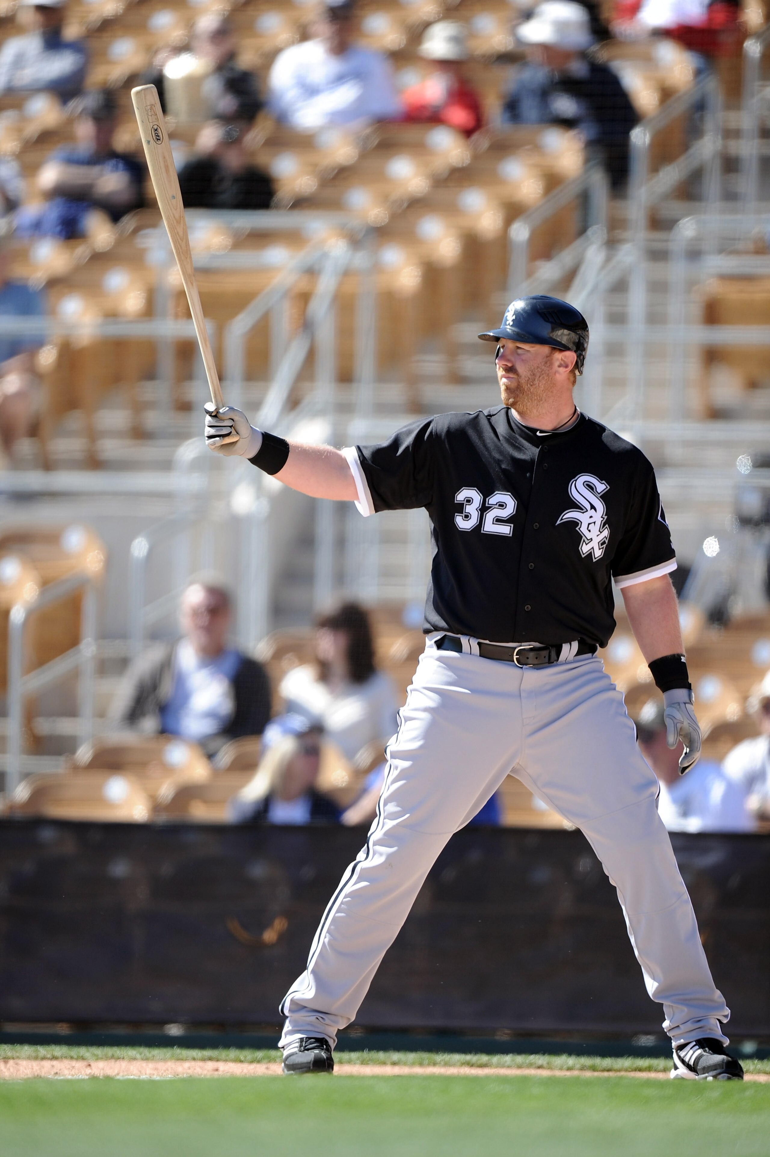 PHOENIX, AZ - FEBRUARY 28:  Adam Dunn #32 of the Chicago White Sox at bat against the Los Angeles Dodgers during spring training at Camelback Ranch on February 28, 2011 in Phoenix, Arizona.  (Photo by Harry How/Getty Images)