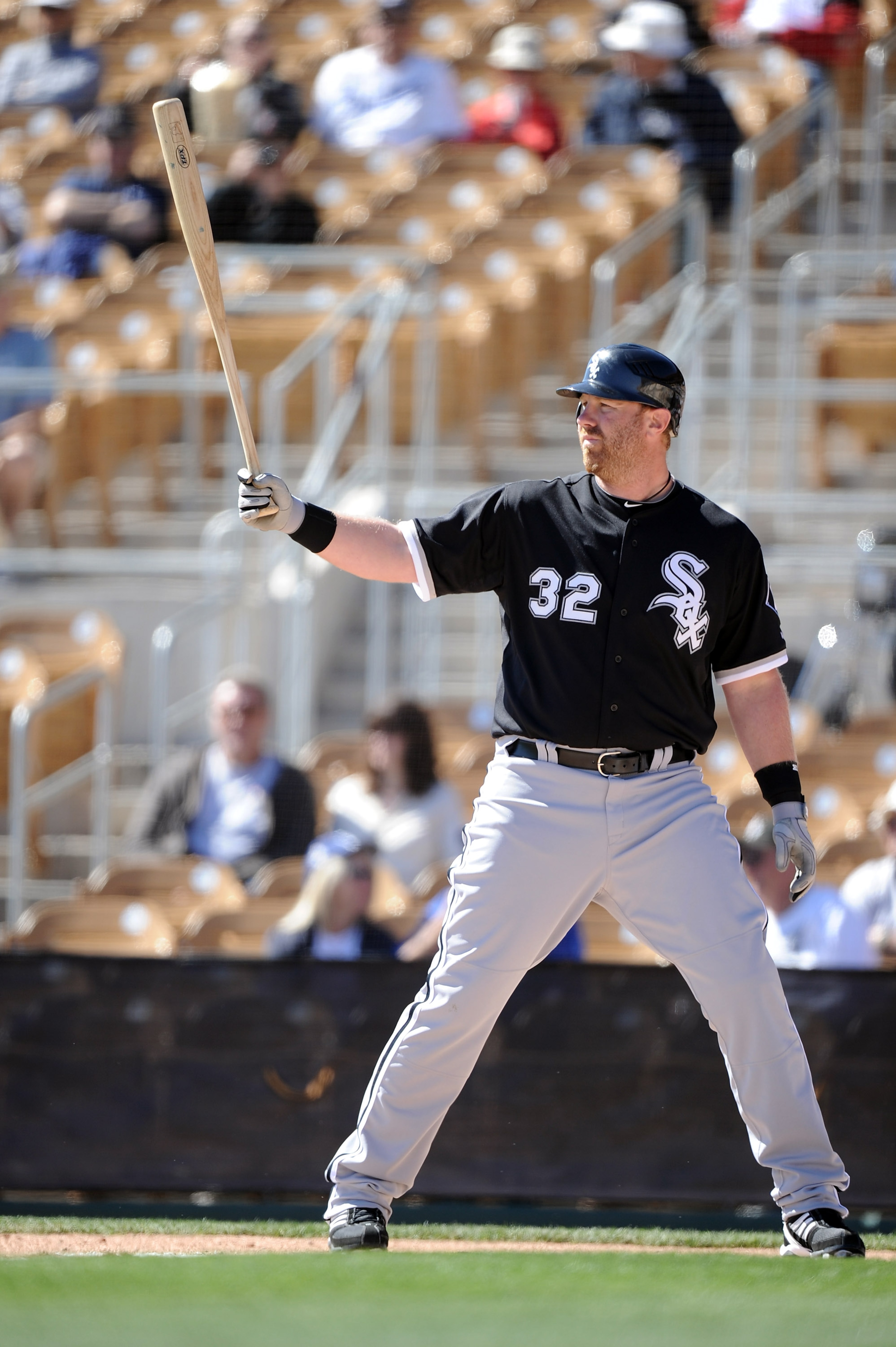 PHOENIX, AZ - FEBRUARY 28:  Adam Dunn #32 of the Chicago White Sox at bat against the Los Angeles Dodgers during spring training at Camelback Ranch on February 28, 2011 in Phoenix, Arizona.  (Photo by Harry How/Getty Images)