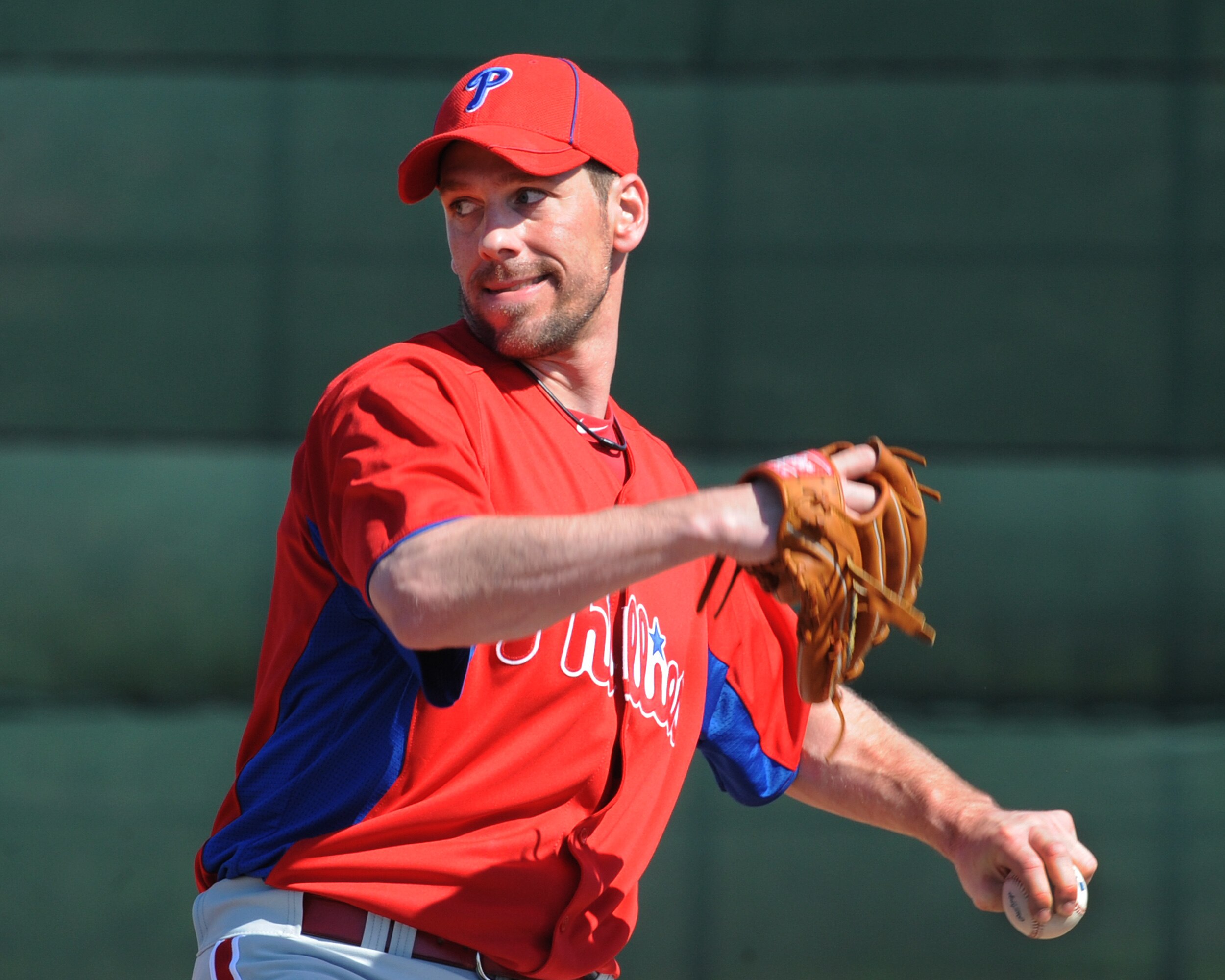 CLEARWATER, FL - FEBRUARY 19:  Pitcher Cliff Lee #33 of the Philadelphia Phillies throws from the mound during a spring training workout February 19, 2011 the Carpenter Complex at Bright House Field in Clearwater, Florida. (Photo by Al Messerschmidt/Getty