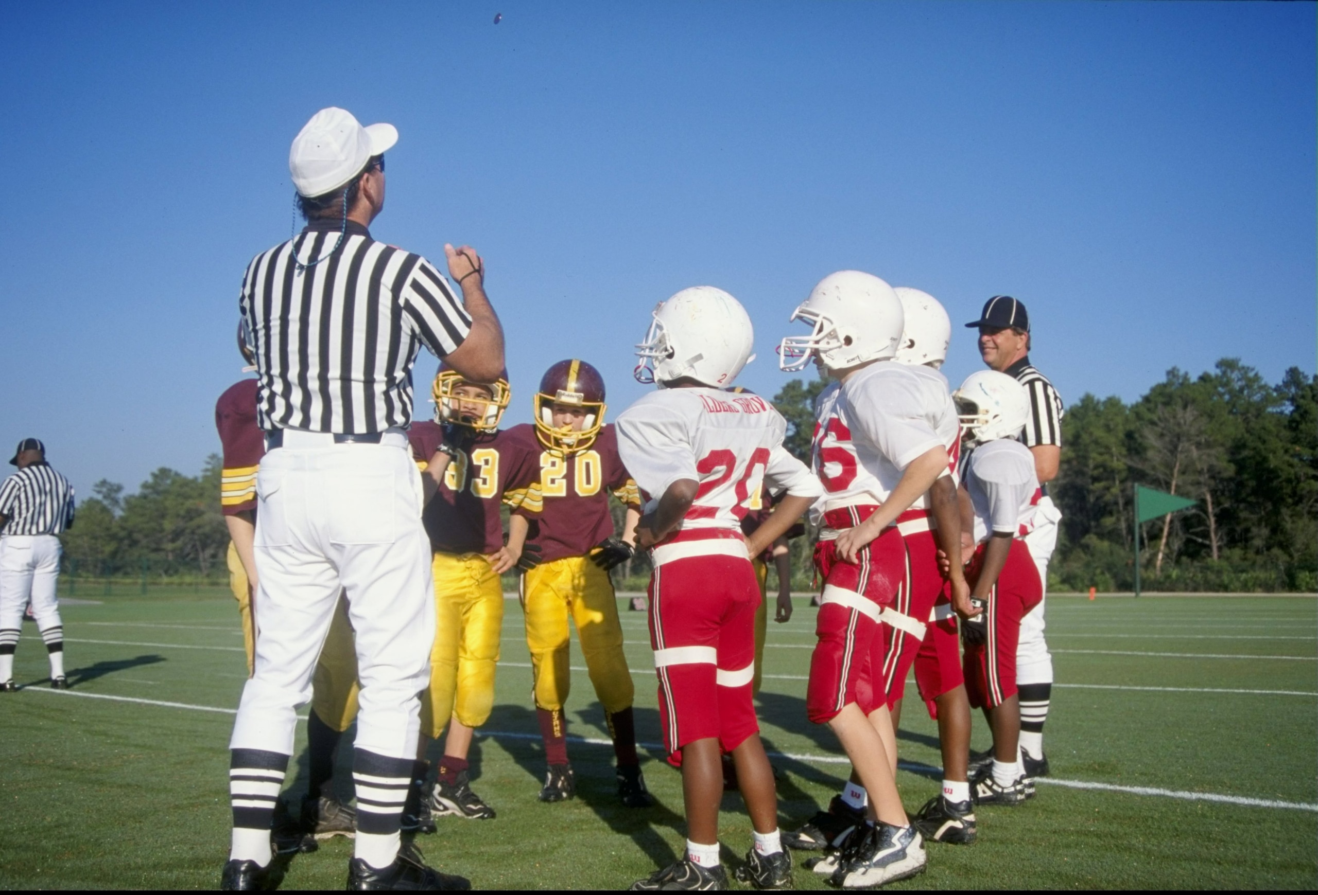 9 Dec 1998: General view of the coin toss during the Pop Warner Pee Wee Football Super Bowl at Disney Wide World of Sports Complex in Orlando, Florida. Mandatory Credit: Scott Halleran /Allsport 9 Dec 1998: General view of the coin toss during the Pop Warner Pee Wee Football Super Bowl at Disney Wide World of Sports Complex in Orlando, Florida. Mandatory Credit: Scott Halleran /Allsport