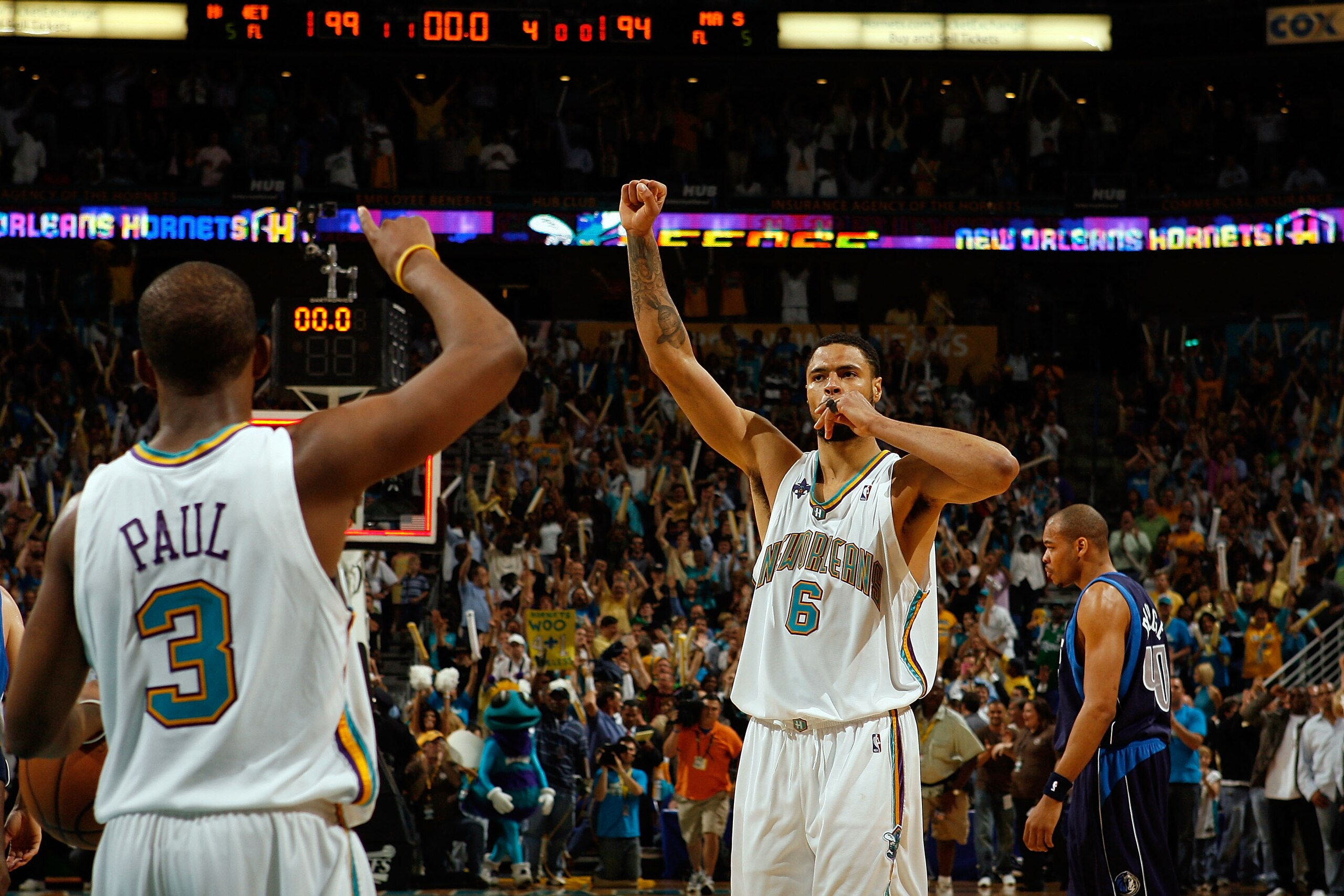 NEW ORLEANS - APRIL 29:  Tyson Chandler #6 and Chris Paul #3 of the New Orleans Hornets celebrate after defeating the Dallas Mavericks in Game Five of the Western Conference Quarterfinals during the 2008 NBA Playoffs at The New Orleans Arena April 29, 200