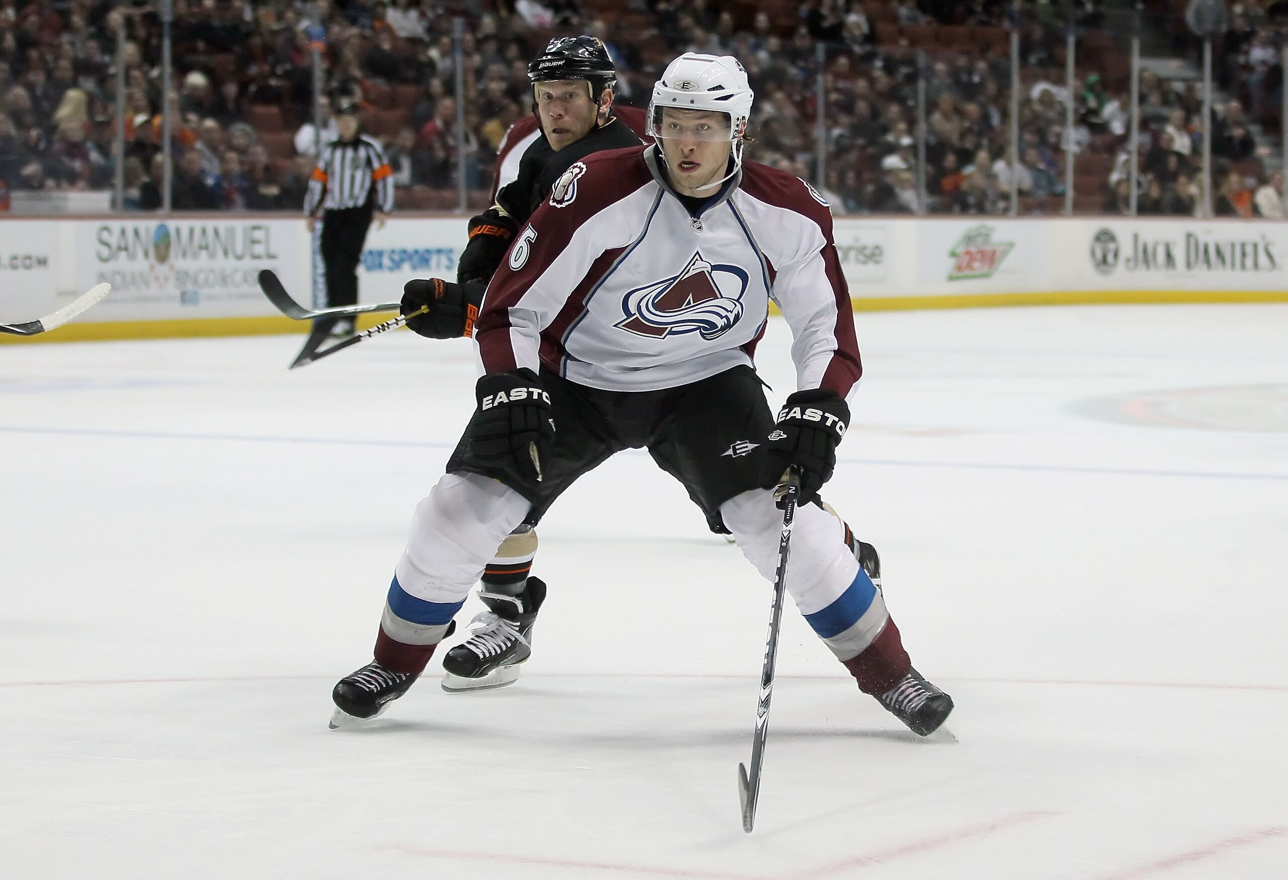 ANAHEIM, CA - FEBRUARY 27:  Erik Johnson #6 of the Colorado Avalanche is pursued by Todd Marchant #22 of the Anaheim Ducks at Honda Center on February 27, 2011 in Anaheim, California.  (Photo by Jeff Gross/Getty Images)