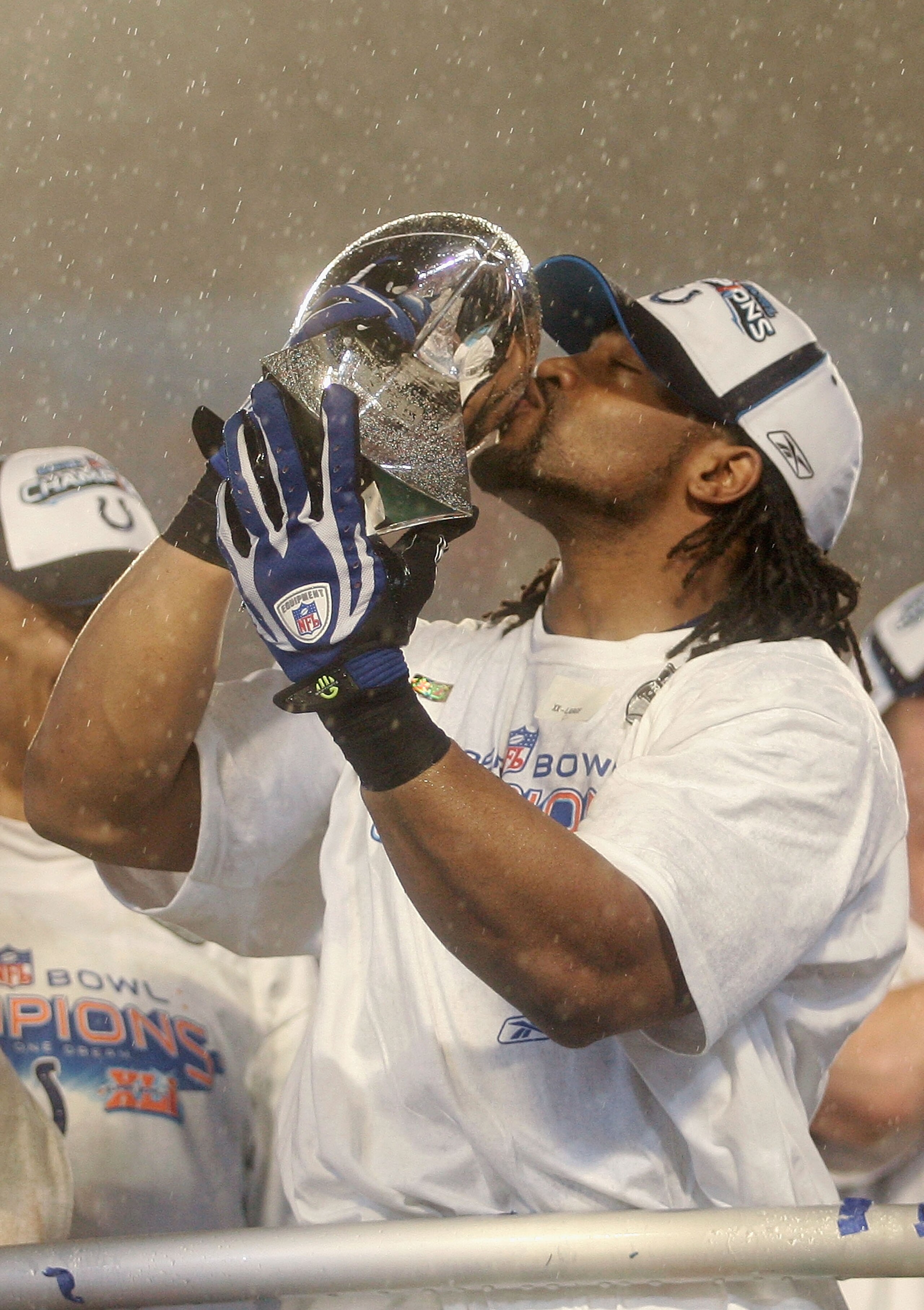 MIAMI GARDENS, FL - FEBRUARY 04:  Bob Sanders #21 of the Indianapolis Colts kisses the Vince Lombardi Trophy after the Colts 29-17 win against the Chicago Bears in Super Bowl XLI on February 4, 2007 at Dolphin Stadium in Miami Gardens, Florida.  (Photo by