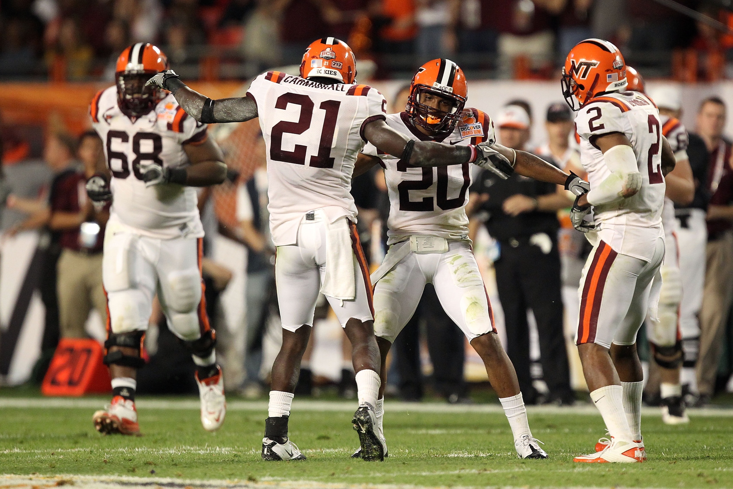 MIAMI, FL - JANUARY 03: Rashad Carmichael #21 and Jayron Hosley #20 of the Virginai Tech Hokies celebrate after Hosley intercepted a pass in the second quarter against the Stanford Cardinal during the 2011 Discover Orange Bowl at Sun Life Stadium on Janu MIAMI, FL - JANUARY 03: Rashad Carmichael #21 and Jayron Hosley #20 of the Virginai Tech Hokies celebrate after Hosley intercepted a pass in the second quarter against the Stanford Cardinal during the 2011 Discover Orange Bowl at Sun Life Stadium on Janu