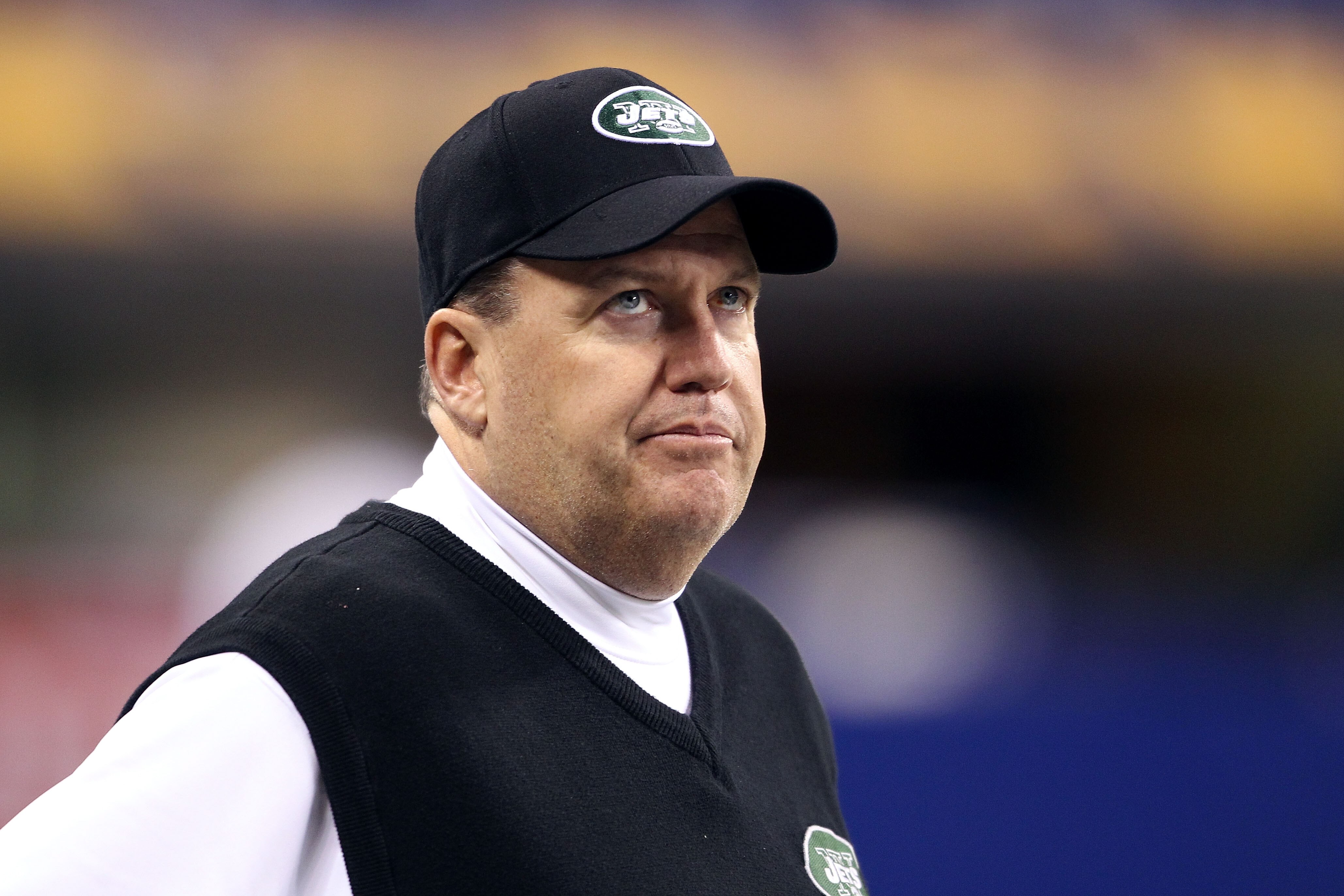 INDIANAPOLIS, IN - JANUARY 08:  Head coach Rex Ryan of the New York Jets looks on during warm ups against the Indianapolis Colts during their 2011 AFC wild card playoff game at Lucas Oil Stadium on January 8, 2011 in Indianapolis, Indiana.  (Photo by Andy