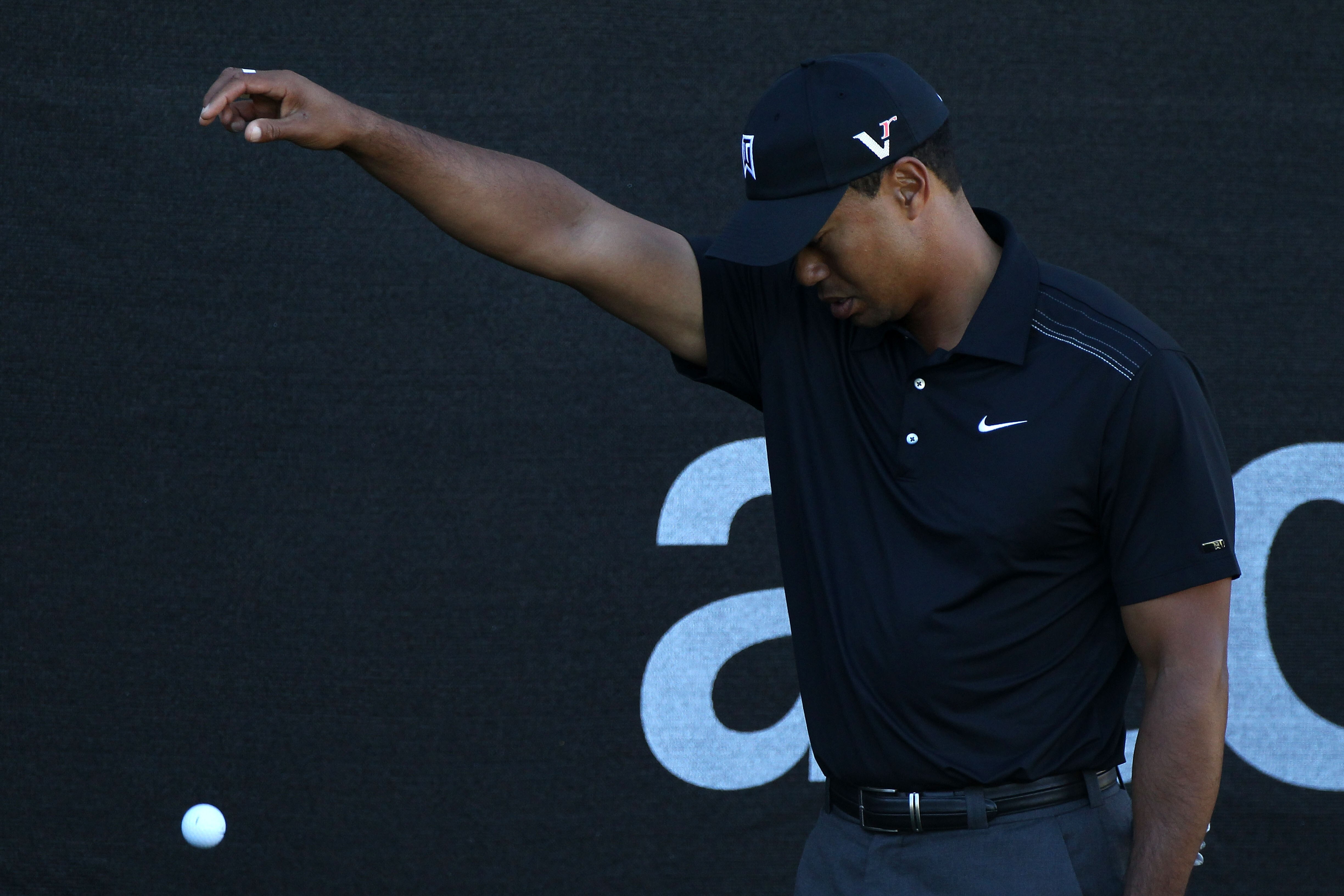 MARANA, AZ - FEBRUARY 23:  Tiger Woods takes a drop on the 16th hole during the first round of the Accenture Match Play Championship at the Ritz-Carlton Golf Club on February 23, 2011 in Marana, Arizona.  (Photo by Sam Greenwood/Getty Images)