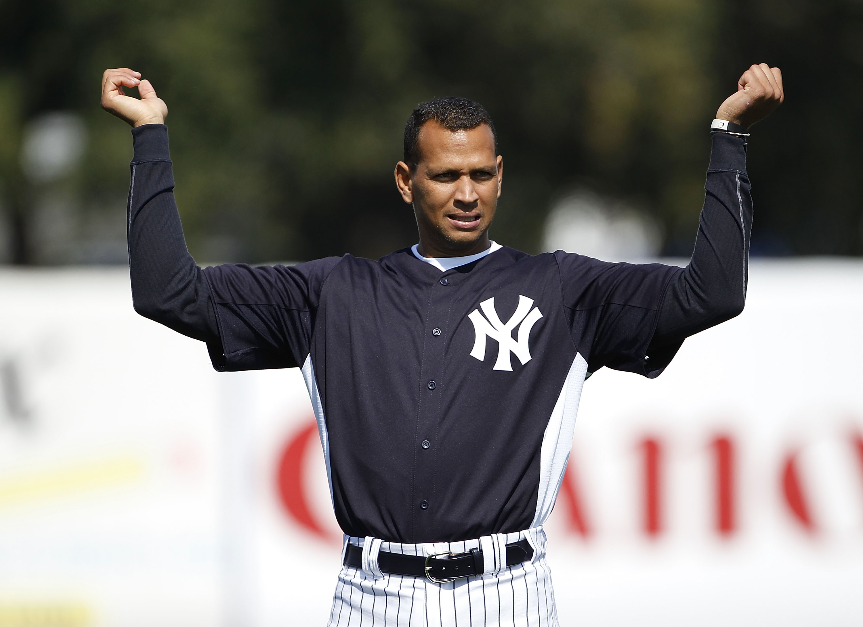 TAMPA, FL - FEBRUARY 20: Alex Rodriguez #13 of the New York Yankees stretches prior to the start if the first full team workout of Spring Training on February 20, 2011 at the George M. Steinbrenner Field in Tampa, Florida.  (Photo by Leon Halip/Getty Imag