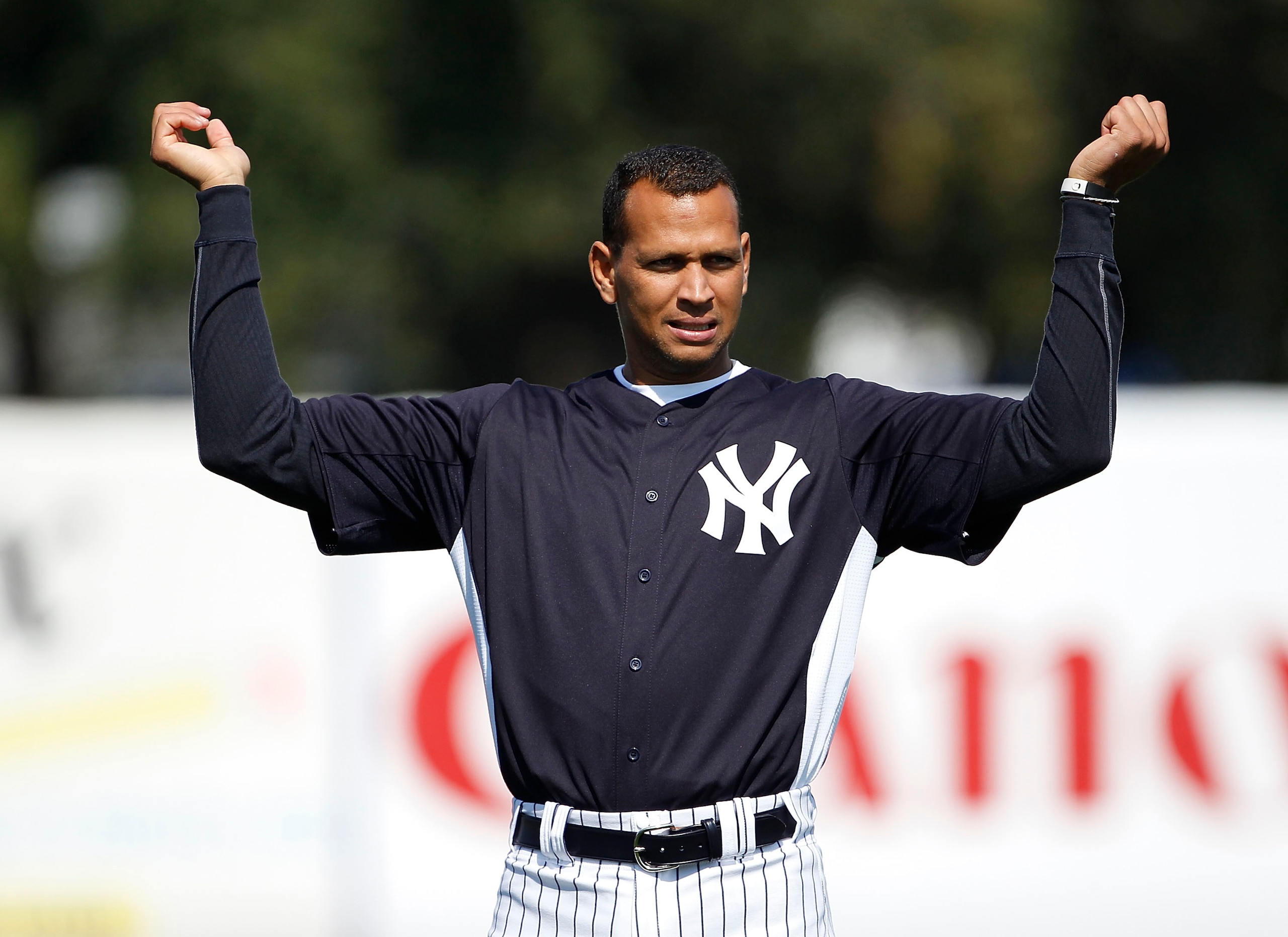 TAMPA, FL - FEBRUARY 20: Alex Rodriguez #13 of the New York Yankees stretches prior to the start if the first full team workout of Spring Training on February 20, 2011 at the George M. Steinbrenner Field in Tampa, Florida.  (Photo by Leon Halip/Getty Imag