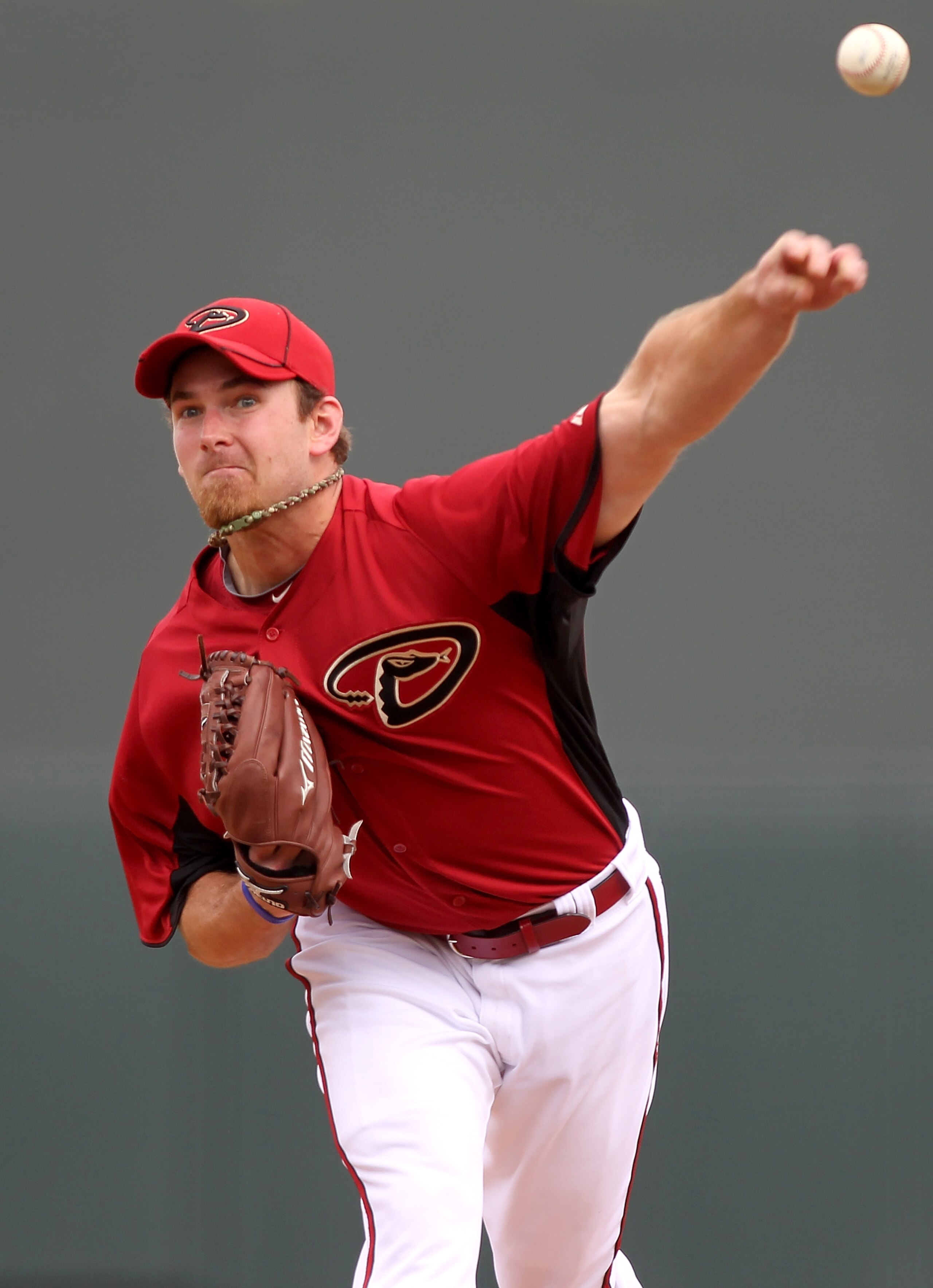 SCOTTSDALE, AZ - FEBRUARY 26:  Zach Duke #19 of the Arizona Diamondbacks pitches against the Colorado Rockies at Salt River Fields on February 26, 2011in Scottsdale, Arizona..  (Photo by Jonathan Ferrey/Getty Images)