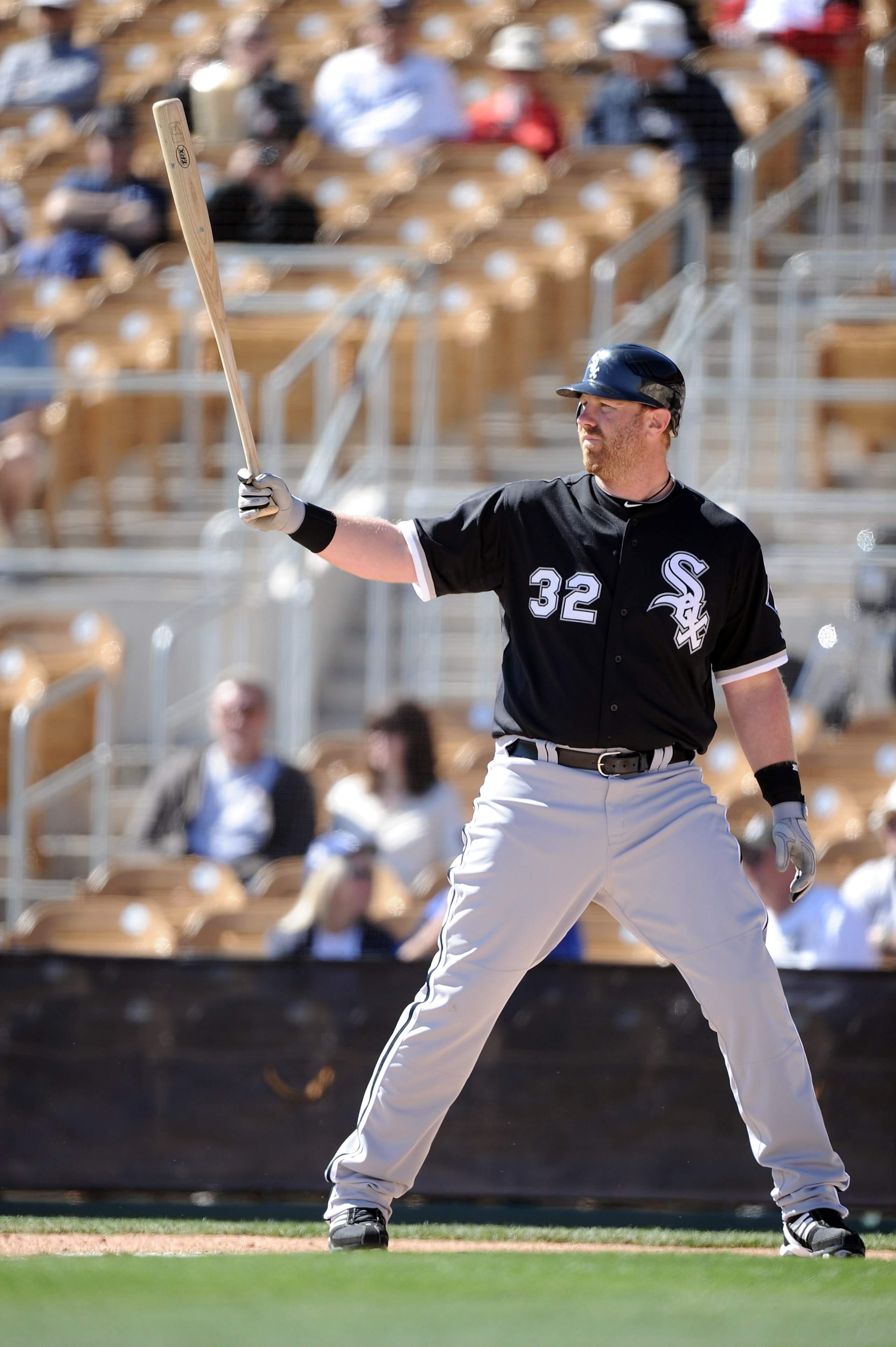 PHOENIX, AZ - FEBRUARY 28:  Adam Dunn #32 of the Chicago White Sox at bat against the Los Angeles Dodgers during spring training at Camelback Ranch on February 28, 2011 in Phoenix, Arizona.  (Photo by Harry How/Getty Images)