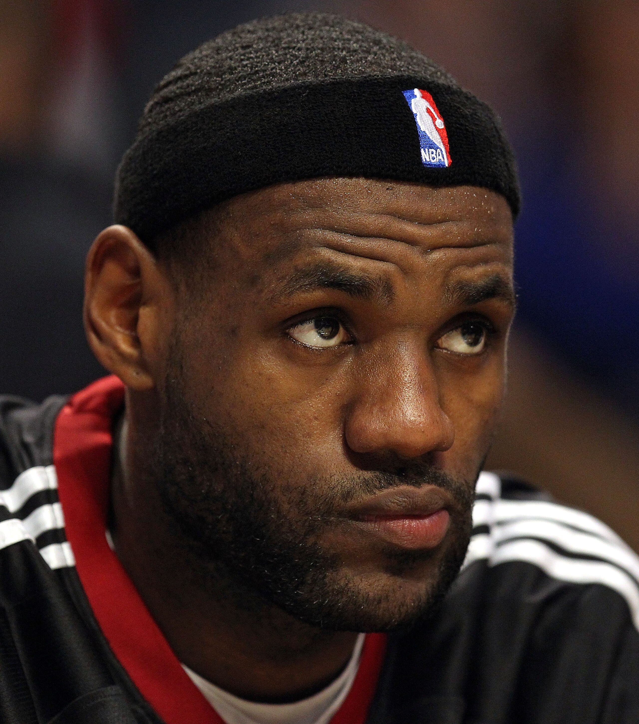 CHICAGO, IL - FEBRUARY 24: LeBron James #6 of the Miami Heat watches from the bench as his team takes on the Chicago Bulls at the United Center on February 24, 2011 in Chicago, Illinois. The Bulls defeated the Heat 93-89. NOTE TO USER: User expressly ackn