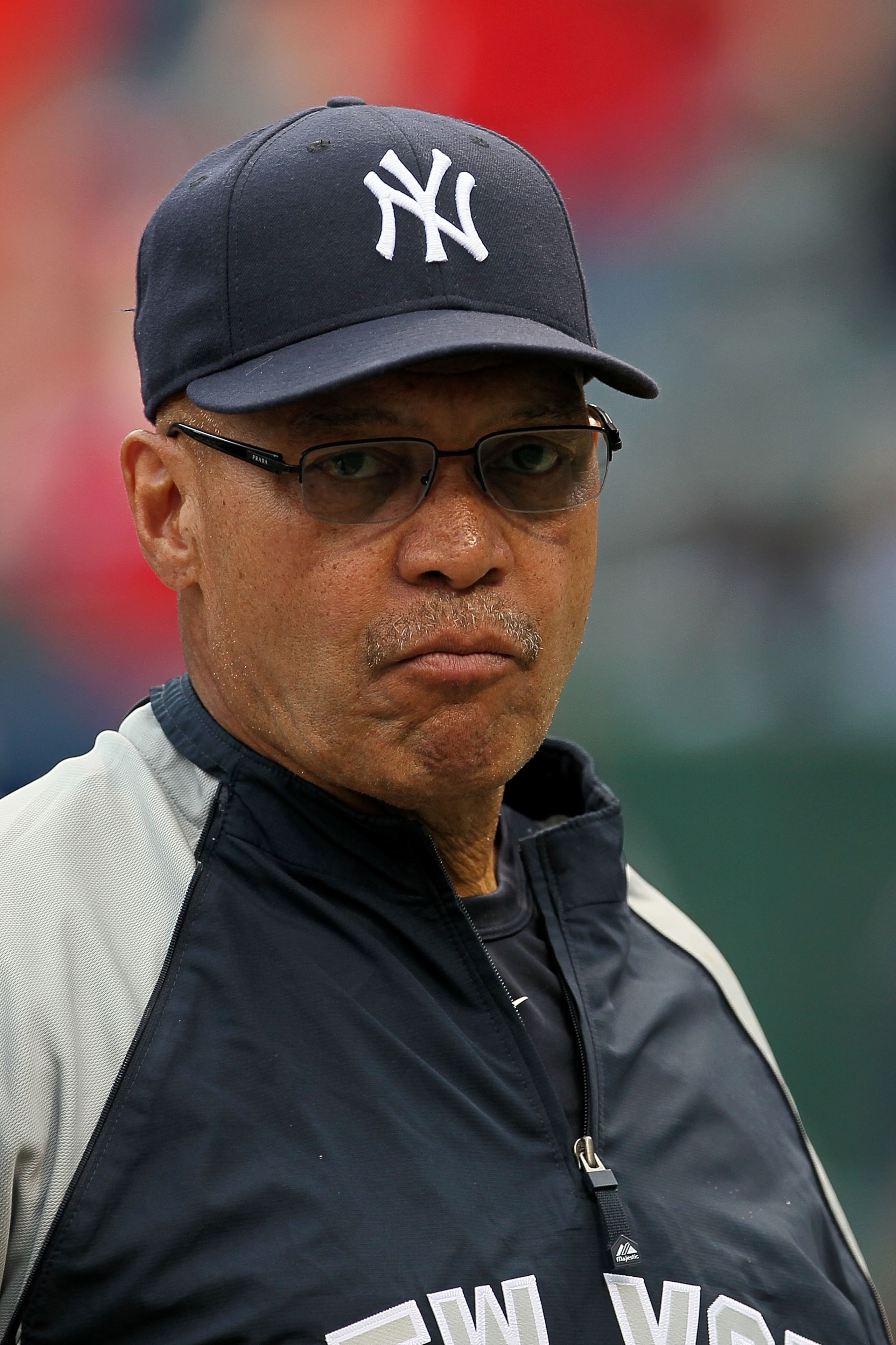 ARLINGTON, TX - OCTOBER 22:  Baseball Hall of Famer Reggie Jackson looks on during batting prior to the New York Yankees playing against the Texas Rangers in Game Six of the ALCS during the 2010 MLB Playoffs at Rangers Ballpark in Arlington on October 22,