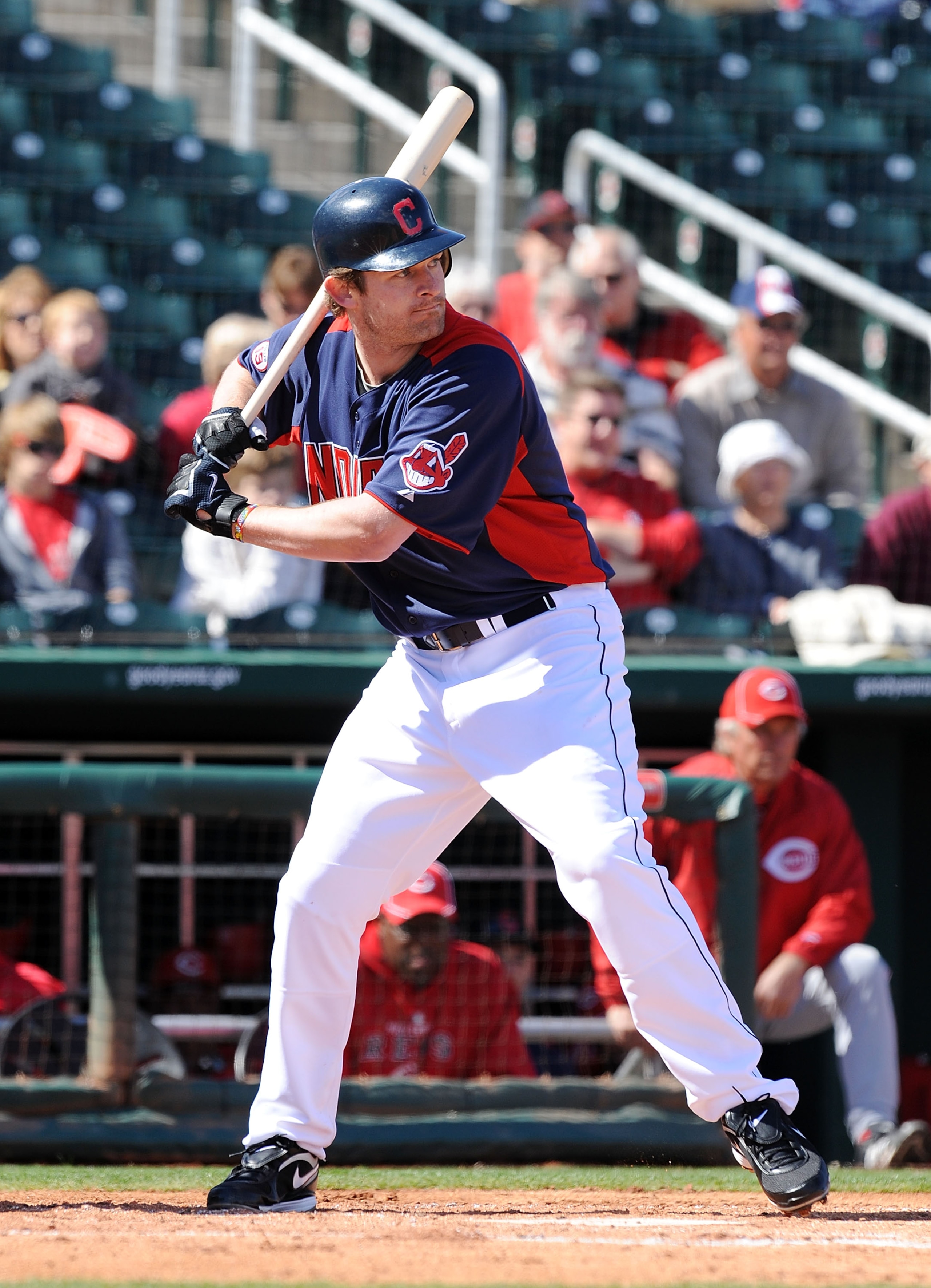 GOODYEAR, AZ - FEBRUARY 27:  Austin Kearns #26 of the Cleveland Indians takes an at bat against the Cincinnati Reds at Goodyear Ballpark on February 27, 2011 in Goodyear, Arizona.  (Photo by Norm Hall/Getty Images)