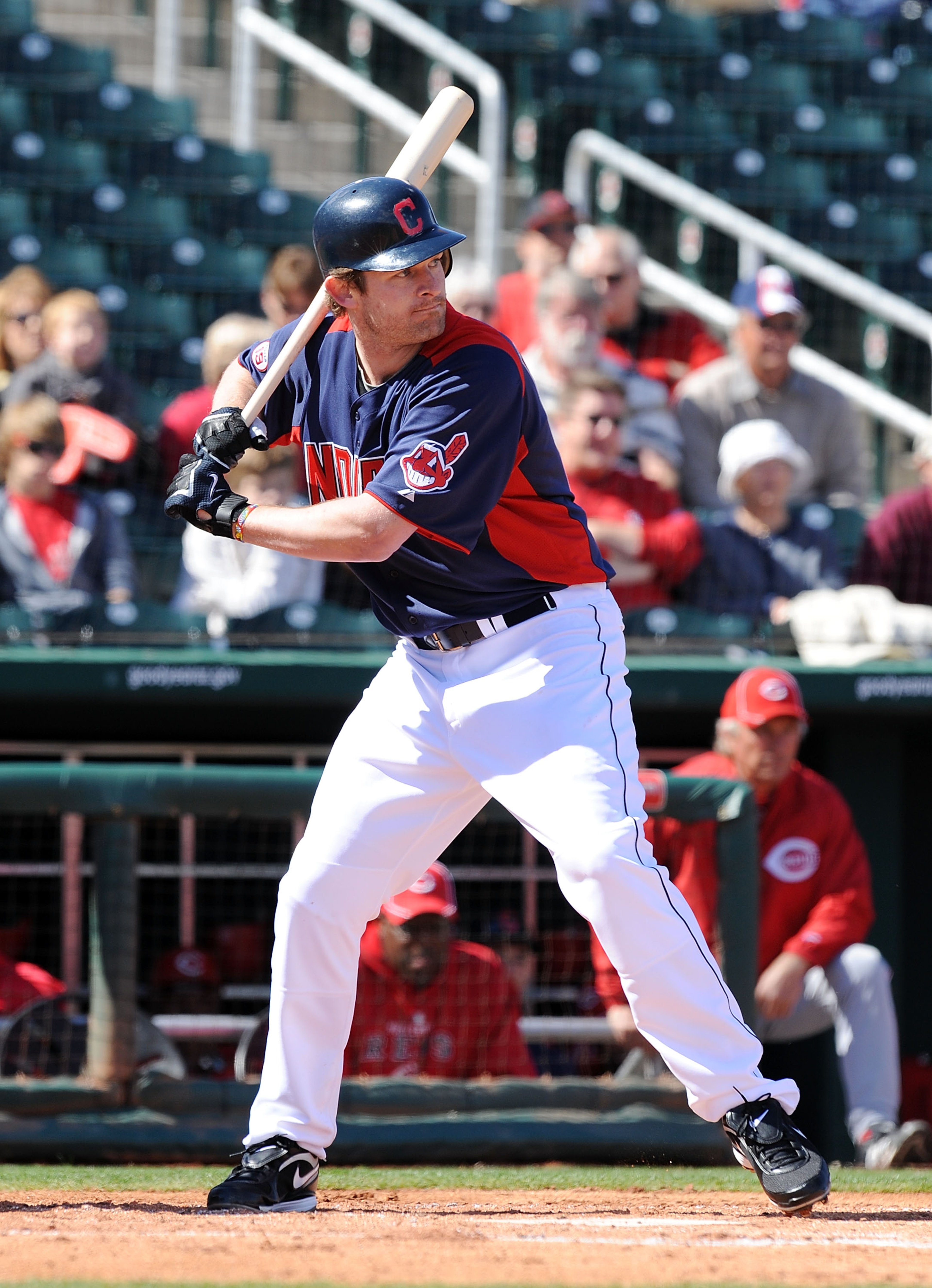 GOODYEAR, AZ - FEBRUARY 27:  Austin Kearns #26 of the Cleveland Indians takes an at bat against the Cincinnati Reds at Goodyear Ballpark on February 27, 2011 in Goodyear, Arizona.  (Photo by Norm Hall/Getty Images)