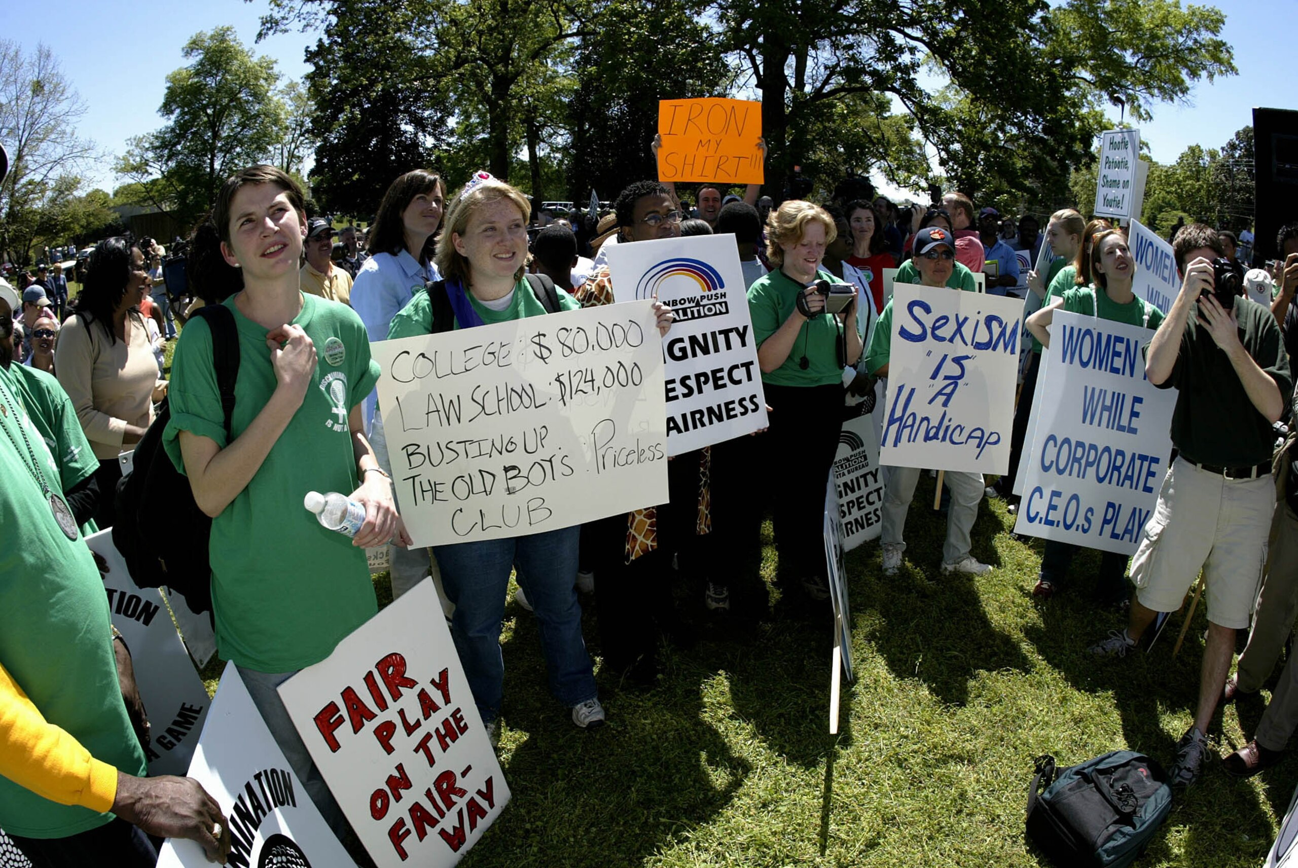 AUGUSTA, GA - APRIL 12:  Pro Martha Burk demonstrators and one anti-Martha Burke protestor gather during Masters week demonstrations on Washington Road outside the gates of Augusta National on April 12, 2003 in Augusta, Georgia.  (Photo by Getty Images)