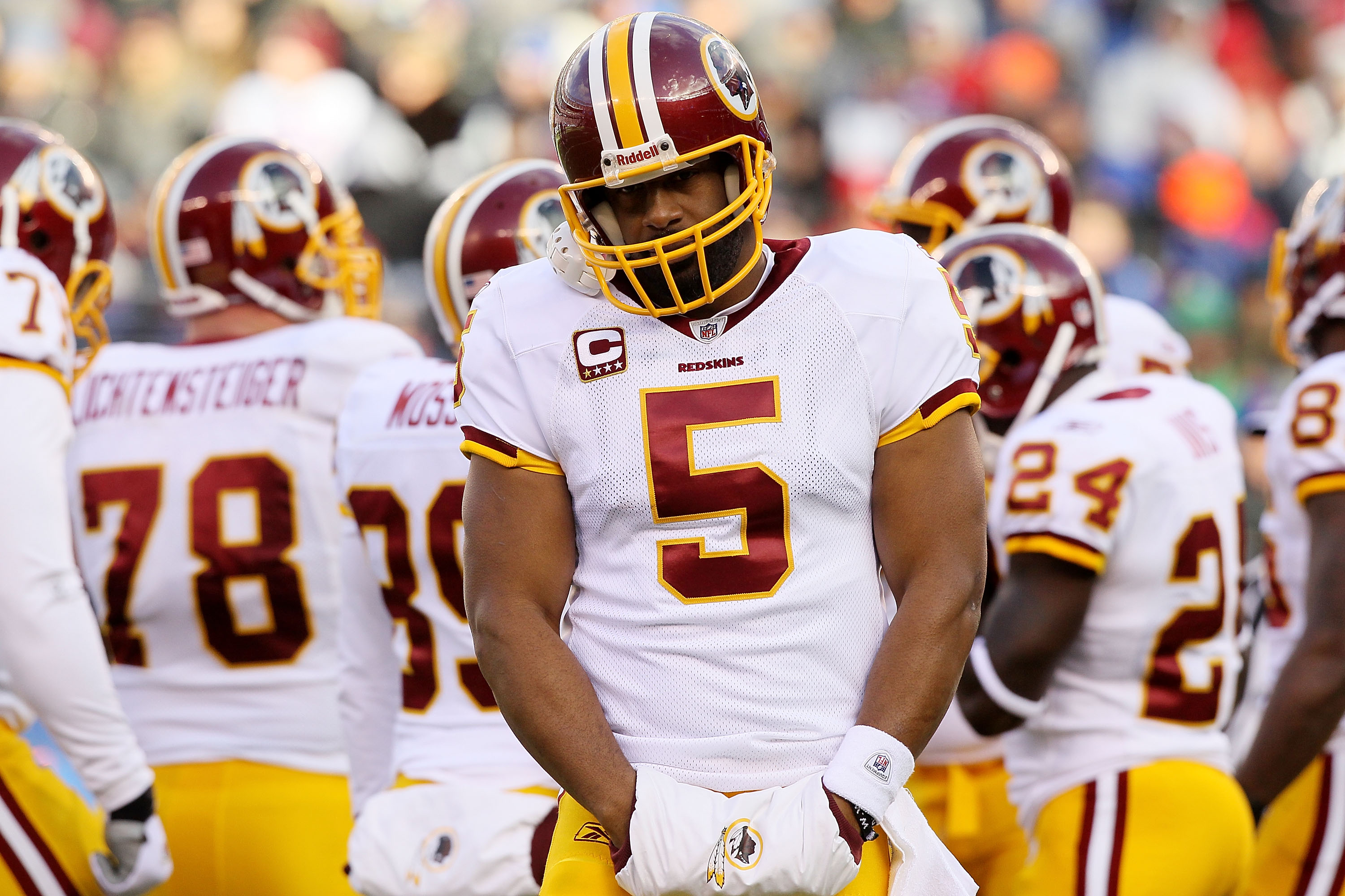EAST RUTHERFORD, NJ - DECEMBER 05:  Donovan McNabb #5 of the Washington Redskins looks on against the New York Giants on December 5, 2010 at the New Meadowlands Stadium in East Rutherford, New Jersey.  (Photo by Jim McIsaac/Getty Images)