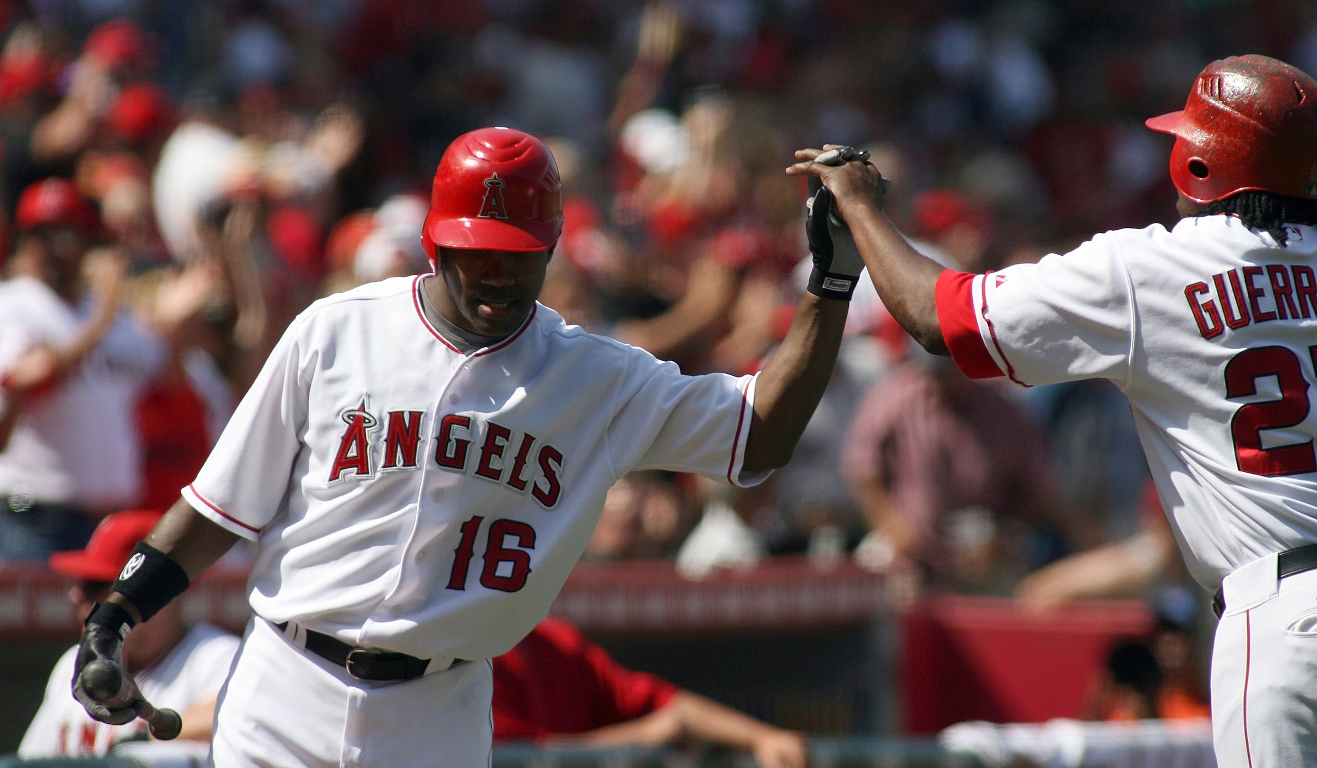 ANAHEIM, CA - JULY 20: Vladimir Guerrero #27 of the Los Angeles Angels of Anaheim celebrates his solo home run with Garrett Anderson #16 in the second inning against the Boston Red Sox at Angels Stadium on July 20, 2008 in Anaheim, California.  (Photo by