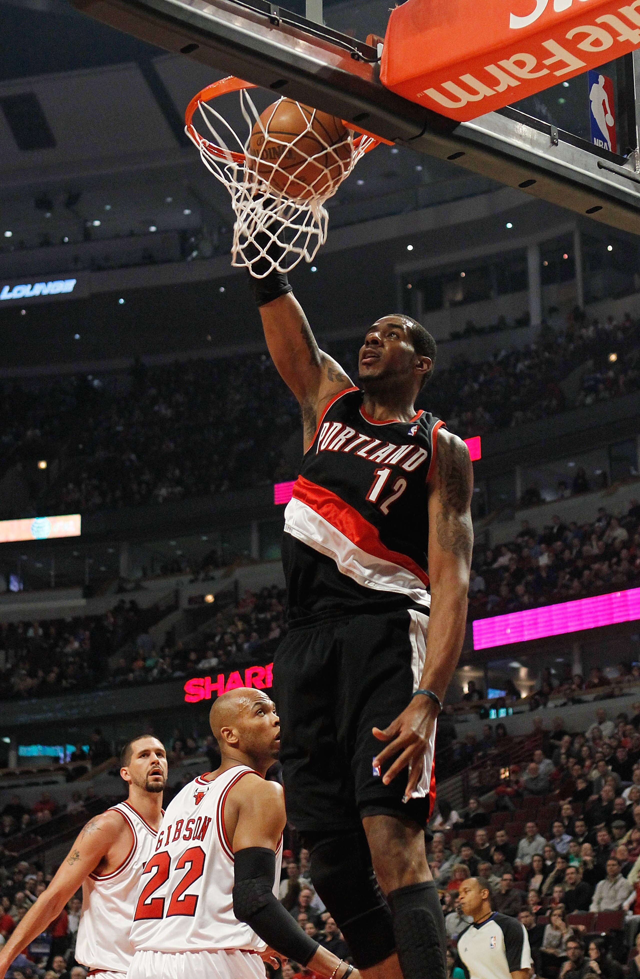 CHICAGO - FEBRUARY 26: LaMarcus Aldridge #12 of the Portland Trail Blazers dunks the ball against the Chicago Bulls at the United Center on February 26, 2010 in Chicago, Illinois. NOTE TO USER: User expressly acknowledges and agrees that, by downloading a