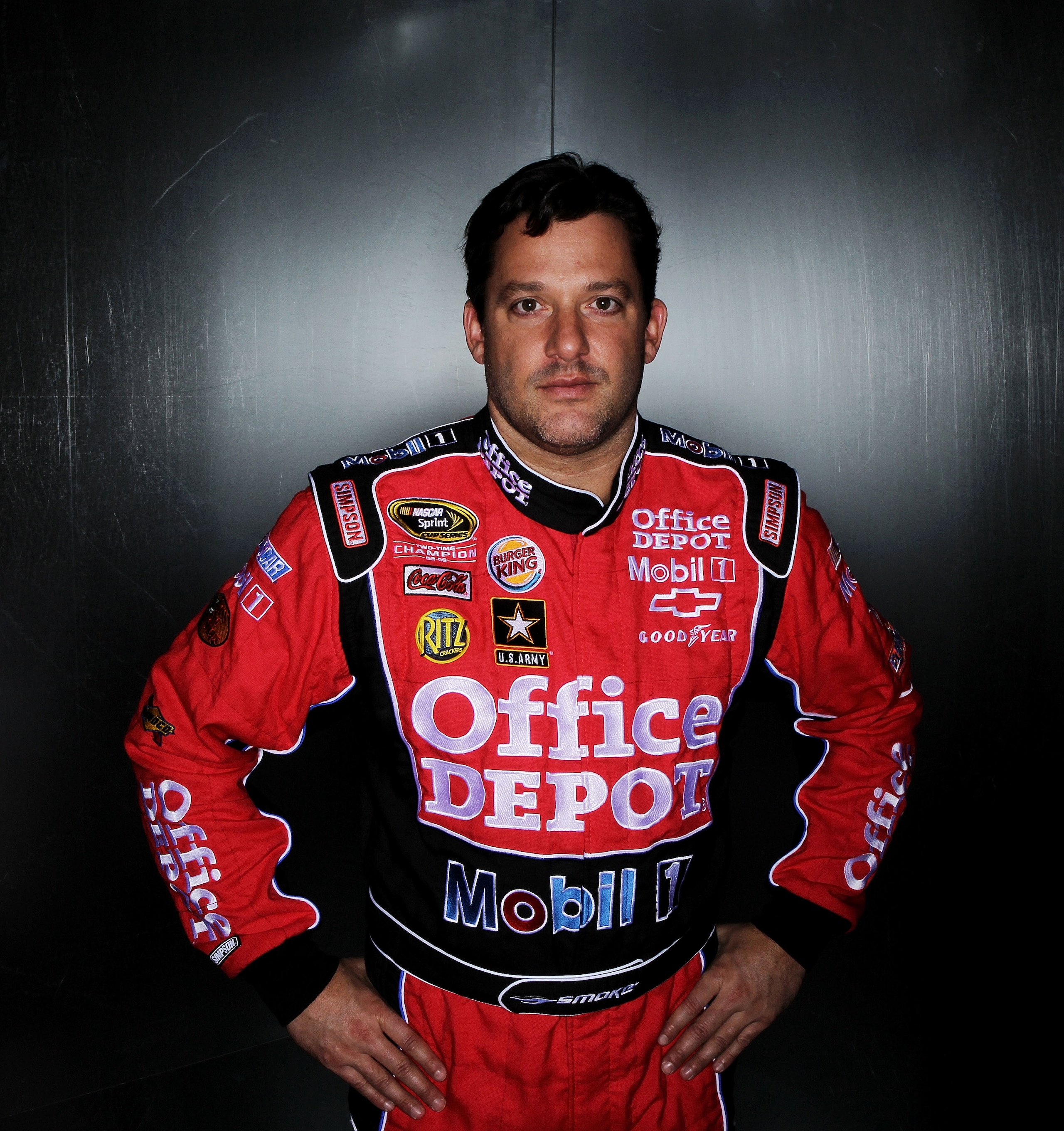 DAYTONA BEACH, FL - FEBRUARY 10:  Tony Stewart, driver of the #14 Office Depot Chevrolet, poses during the 2011 NASCAR Sprint Cup Series Media Day at Daytona International Speedway on February 10, 2011 in Daytona Beach, Florida.  (Photo by Nick Laham/Gett