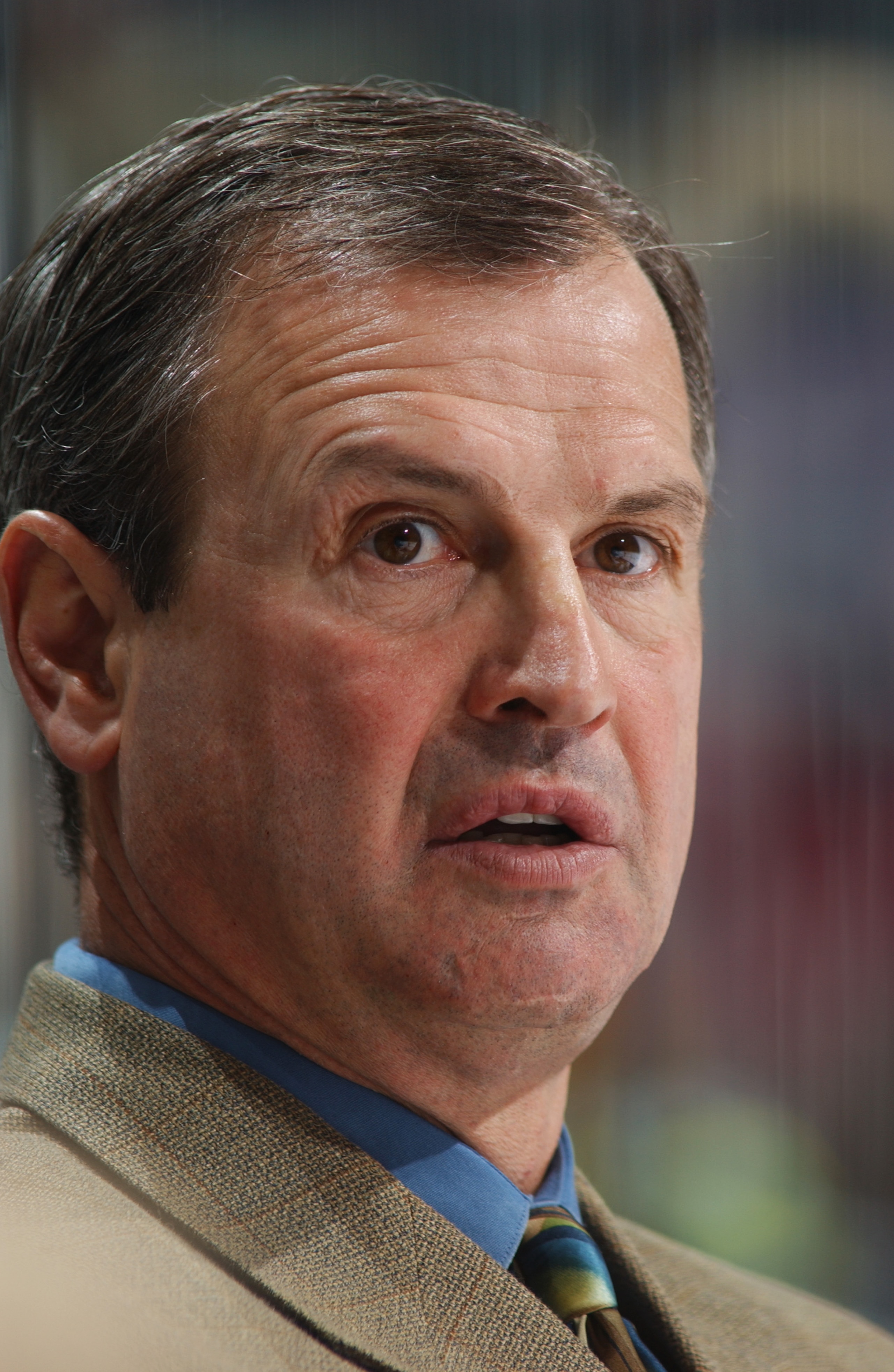 ATLANTA - OCTOBER 18:  Head coach Brian Sutter of the Chicago Blackhawks watches the game against his Atlanta Thrashers at Philips Arena on October 18, 2003 in Atlanta, Georgia.  The Thrashers defeated the Blackhawks 7-2.  (Photo by Scott Cunningham/Getty