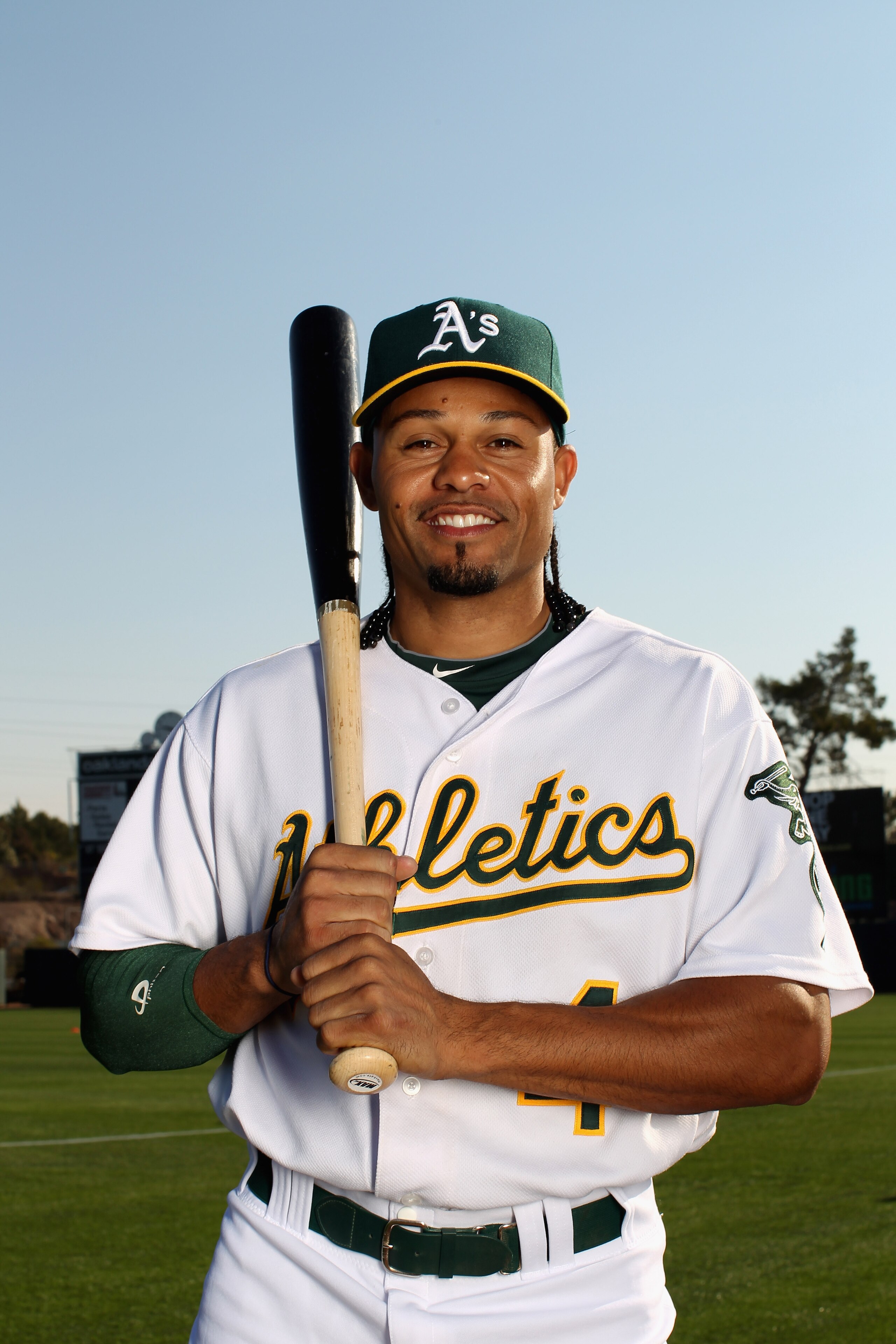 PHOENIX, AZ - FEBRUARY 24: Coco Crisp #4 of the Oakland Athletics poses for a portrait during media photo day at Phoenix Municipal Stadium on February 24, 2011 in Phoenix, Arizona.  (Photo by Ezra Shaw/Getty Images)