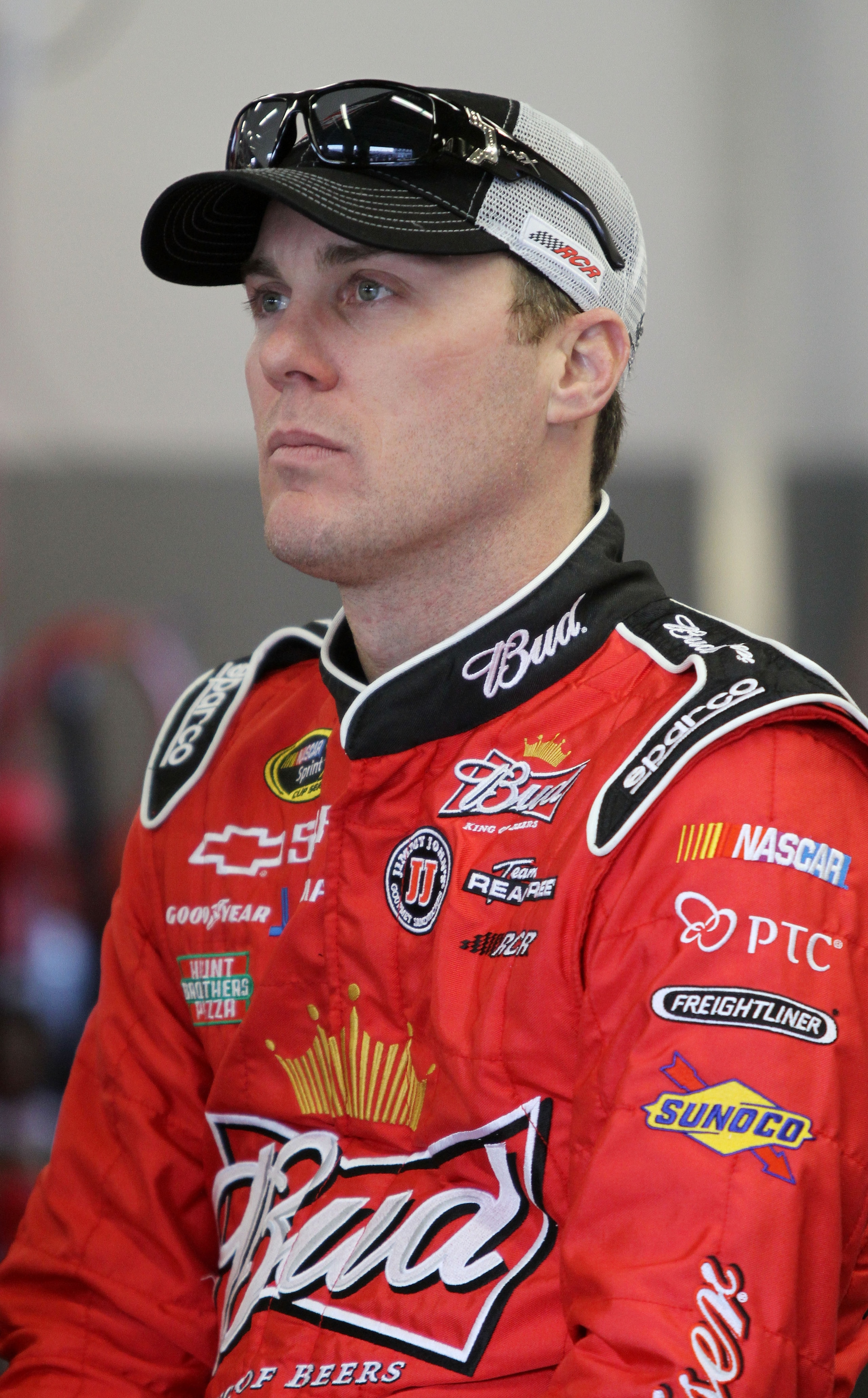 DAYTONA BEACH, FL - FEBRUARY 11:  Kevin Harvick, driver of the #29 Budweiser Chevrolet, sits in the garage area during practice for the NASCAR Budweiser Shootout at Daytona International Speedway on February 11, 2011 in Daytona Beach, Florida.  (Photo by