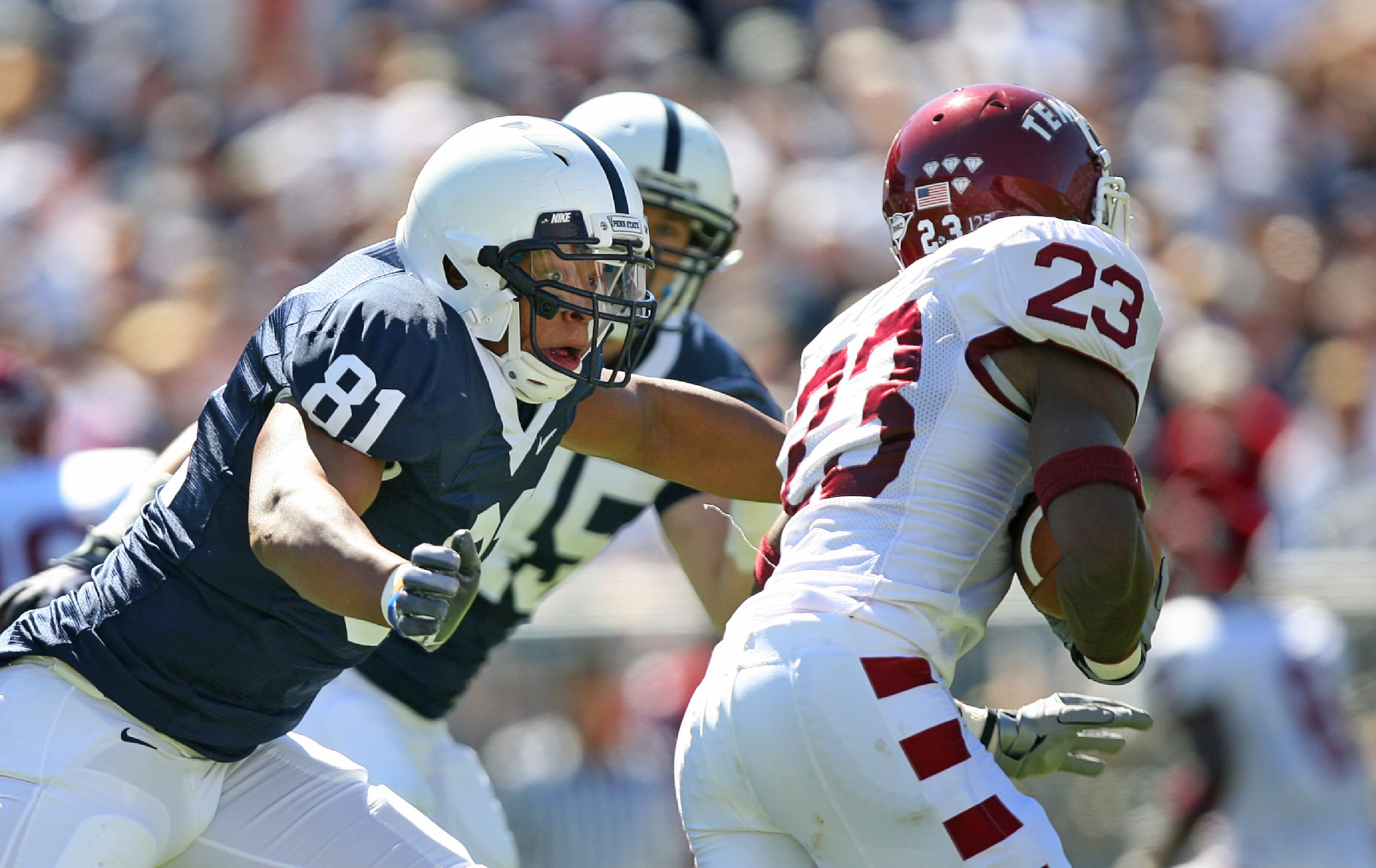 STATE COLLEGE, PA - SEPTEMBER 19: Defensive end Jack Crawford #81 of the Penn State Nittany Lions pursues wide receiver James Nixon #23 of the Temple Owls during a game on September 19, 2009 at Beaver Stadium in State College, Pennsylvania. (Photo by Hunt STATE COLLEGE, PA - SEPTEMBER 19: Defensive end Jack Crawford #81 of the Penn State Nittany Lions pursues wide receiver James Nixon #23 of the Temple Owls during a game on September 19, 2009 at Beaver Stadium in State College, Pennsylvania. (Photo by Hunt