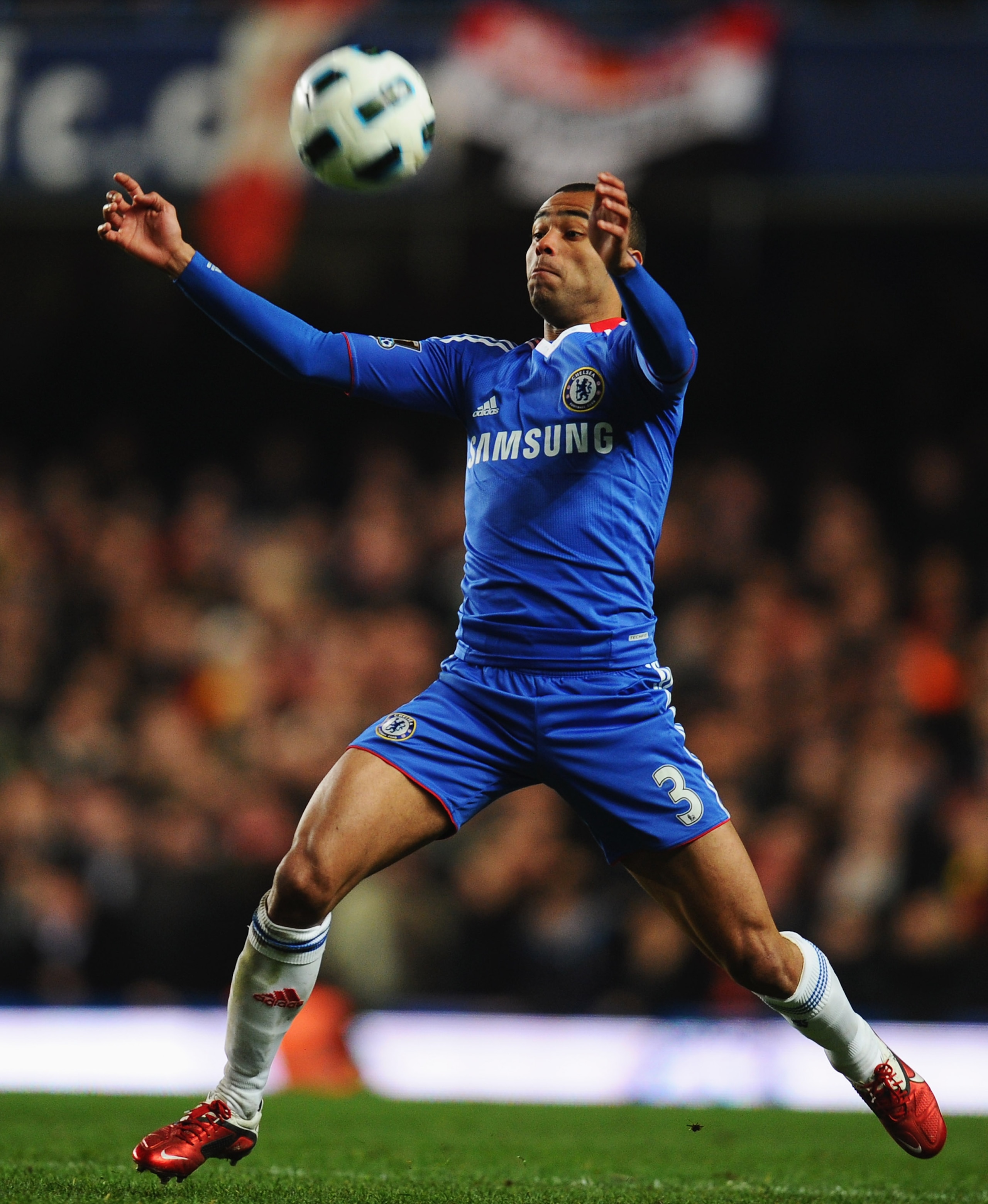 LONDON, ENGLAND - MARCH 01: Ashley Cole of Chelsea controls the ball during the Barclays Premier League match between Chelsea and Manchester United at Stamford Bridge on March 1, 2011 in London, England.  (Photo by Clive Mason/Getty Images)