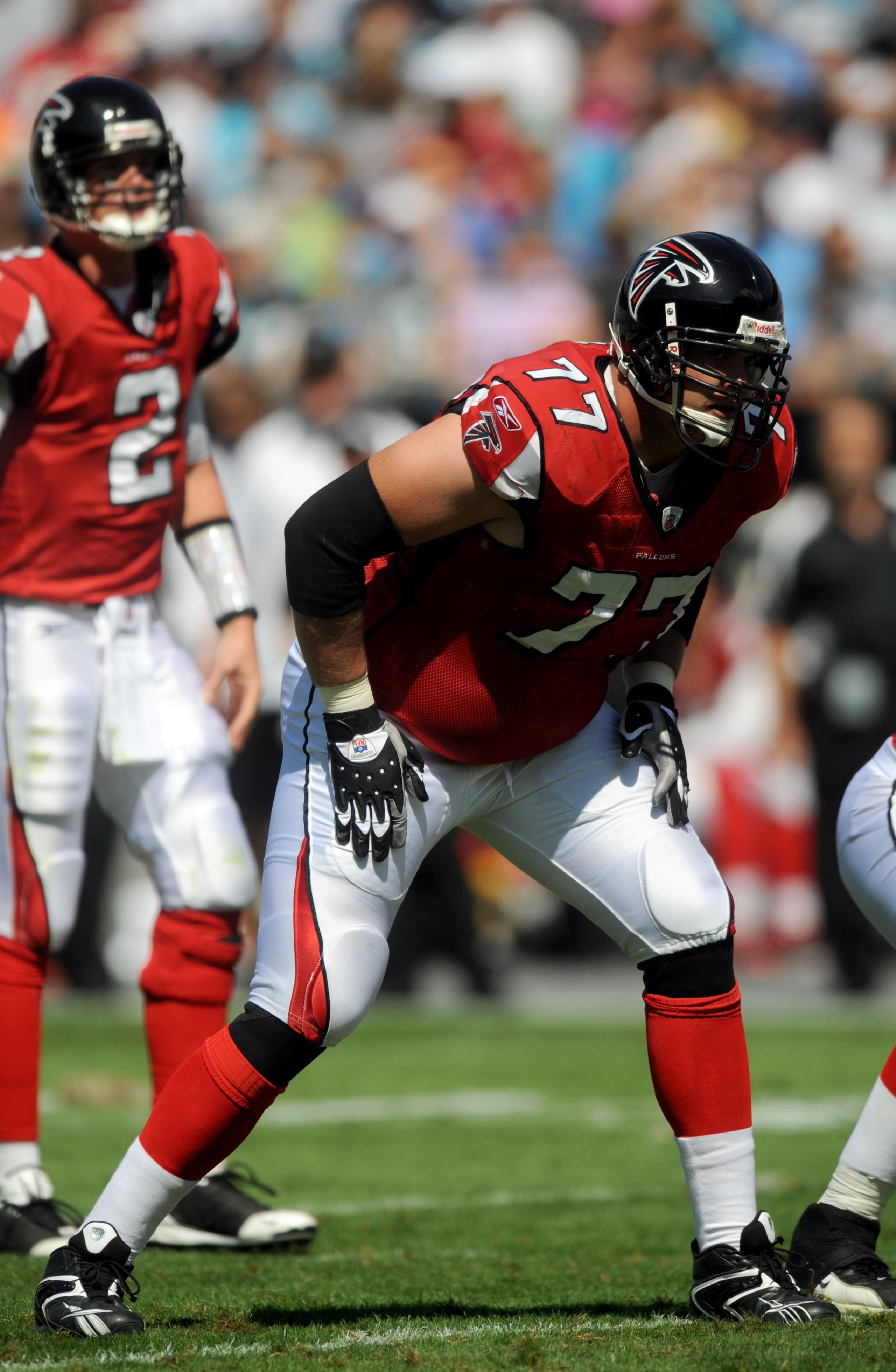 CHARLOTTE, NC - SEPTEMBER 28: Offensive tackle Tyson Clabo #77 of the Atlanta Falcons gets set at the line of scrimmage in the first quarter the game against the Carolina Panthers at Bank of America Stadium on September 28, 2008 in Charlotte, North Caroli